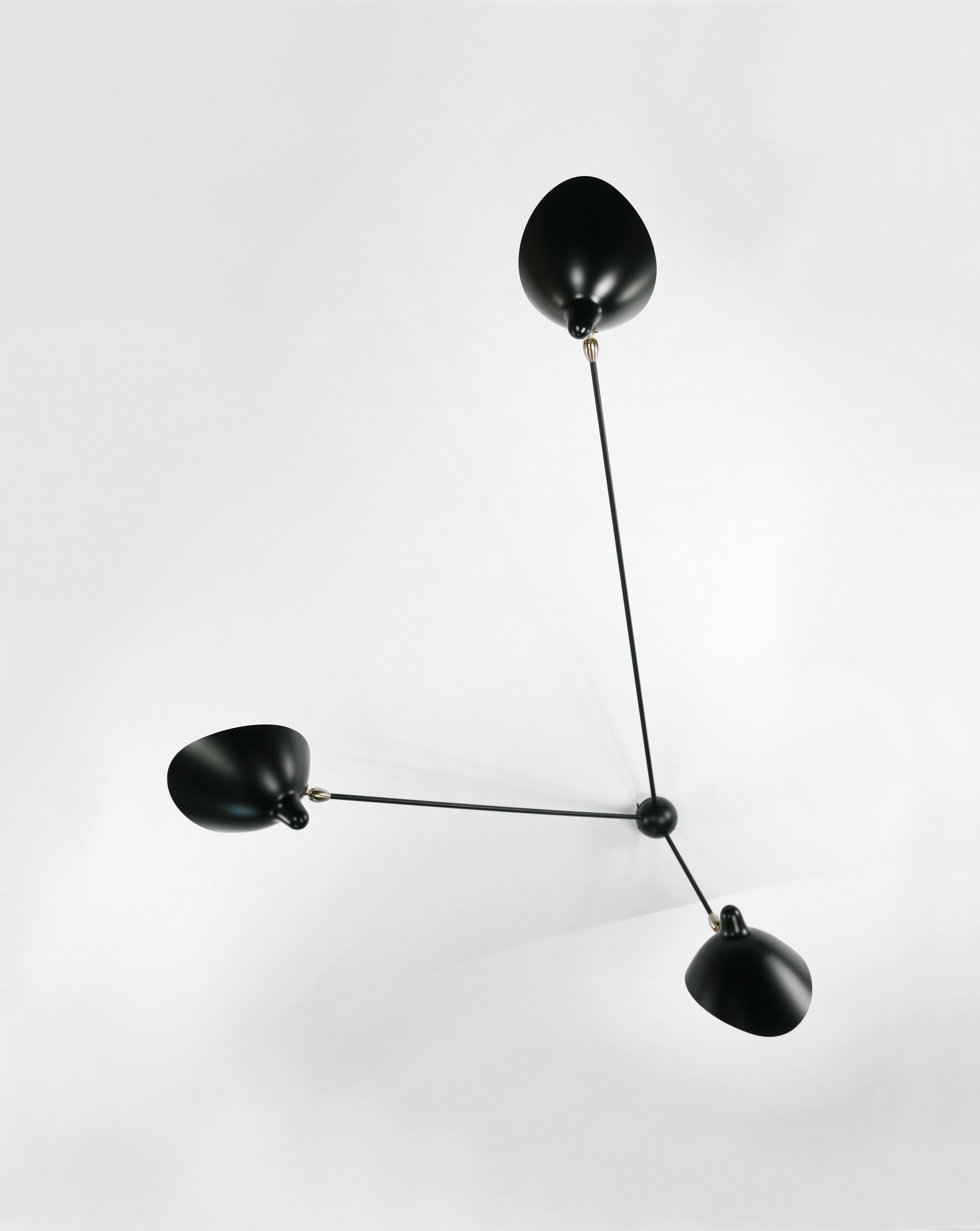 Wall ceiling lamp model 'three fixed arms spider ceiling lamp' designed by Serge Mouille in 1952.

Manufactured by Editions Serge Mouille in France. The production of lamps, wall lights and floor lamps are manufactured using craftsman’s techniques