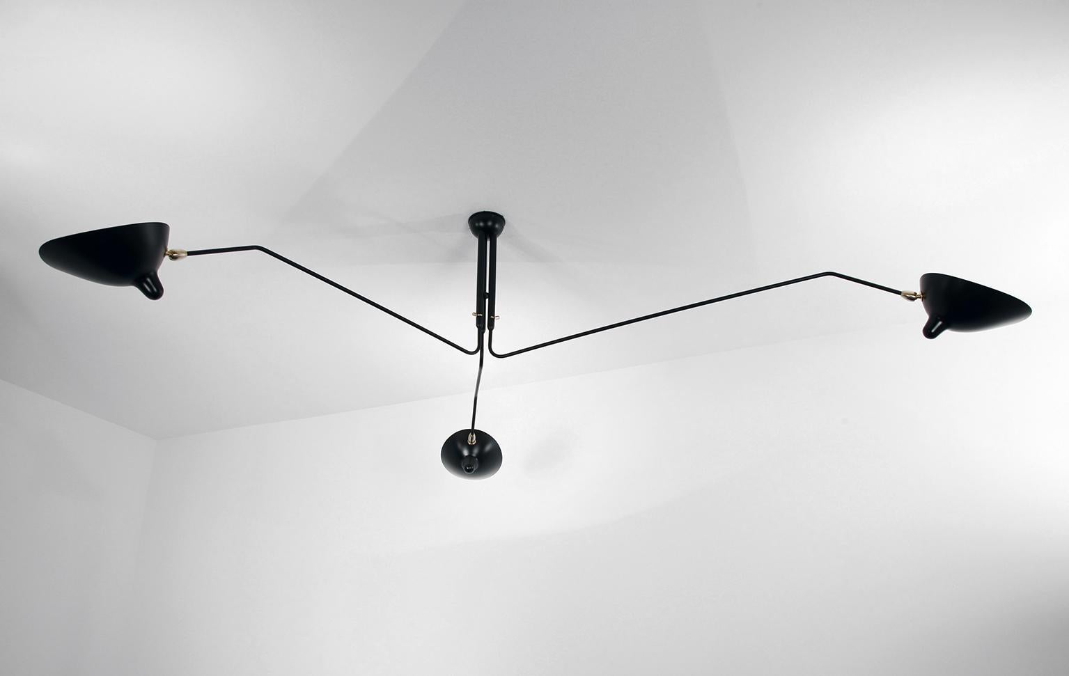 Serge Mouille Mid-Century Modern black three rotating arms ceiling lamp
Ceiling Lamp model 'Three Rotating Arms Ceiling Lamp' designed by Serge Mouille in 1958.

Manufactured by Editions Serge Mouille in France. The production of lamps, wall