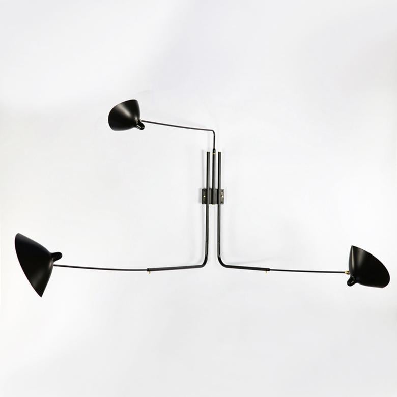 Wall lamp model 'Three Rotating Straight Arms Wall Lamp' designed by Serge Mouille in 1954.

Manufactured by Editions Serge Mouille in France. The production of lamps, wall lights and floor lamps are manufactured using craftsman’s techniques with