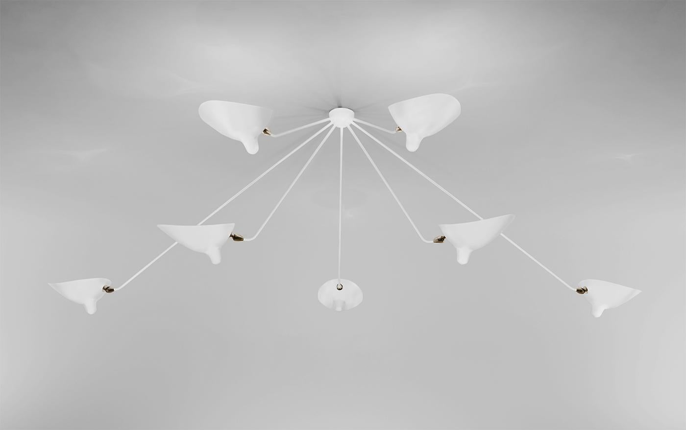 Plafonnier mural modèle 'seven fixed arms spider ceiling lamp' conçu par Serge Mouille en 1953.

Fabriqué par les Editions Serge Mouille en France. La production des lampes, des appliques et des lampadaires est réalisée de manière artisanale avec