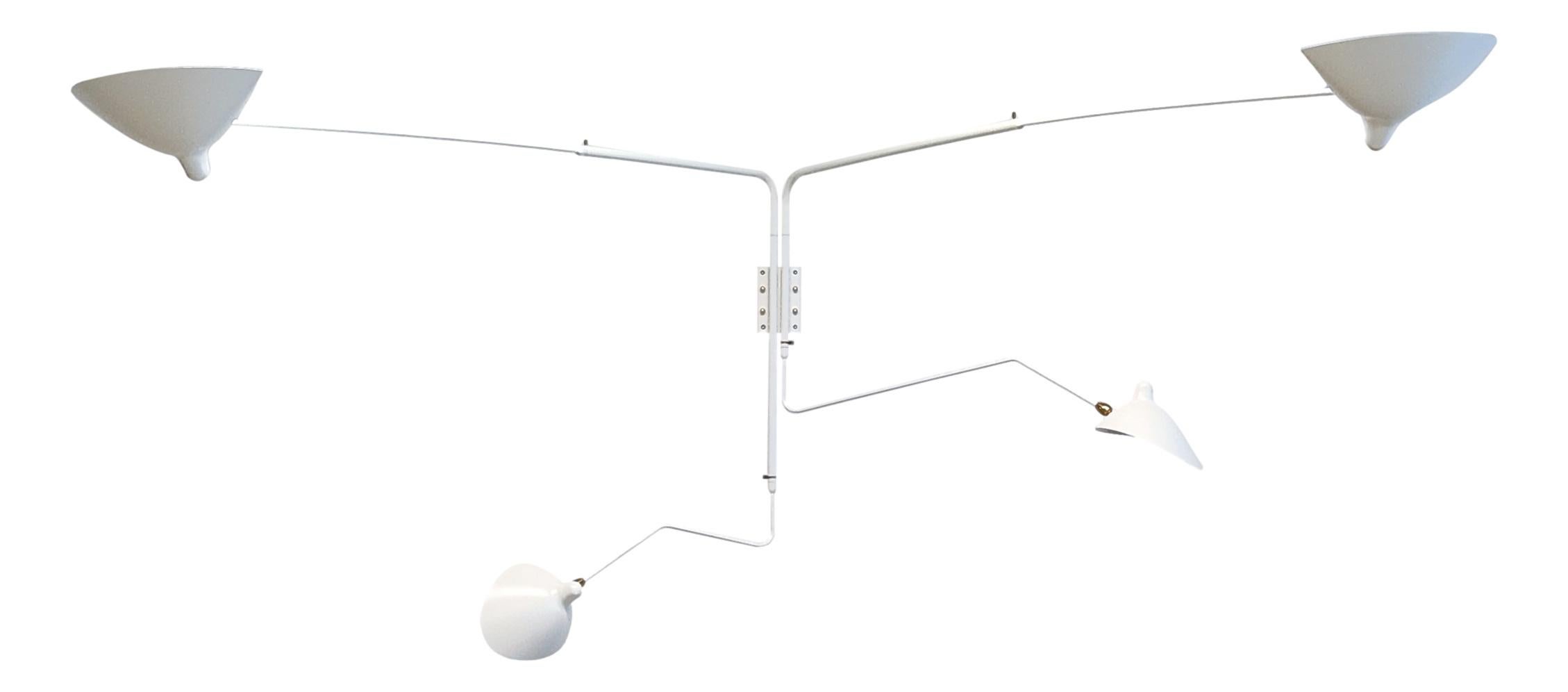 This sconce is designed so that one short and one long arm rotate at the same time creating a unique effect with illumination. Shades pivot in place. Switches located on mounting plate. Arm lengths to tip of shade 96