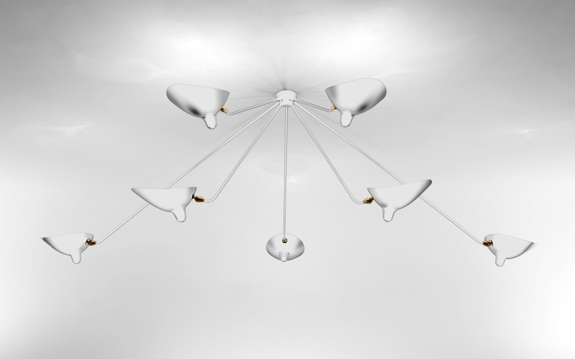 This lamp with rotating heads on seven fixed arms is a statement as much as it is a ceiling lamp - one that will command the conversation.

Available in white or black. Brass swivels connect the shades.

Color option
Available in Black or