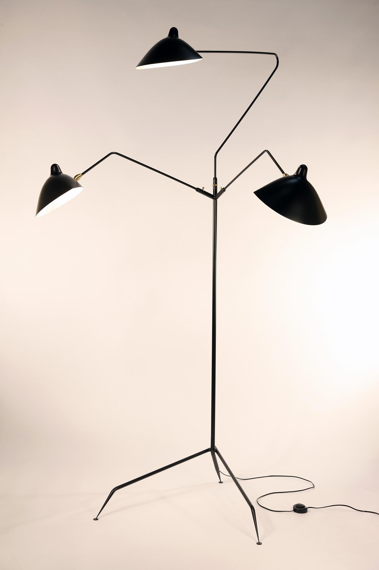 DESCRIPTION: 
This is the most versatile lamp of the Mouille collection. Each ‘chapeau’ shade can be oriented differently. Sculptural in form with three rotating arms, it stands majestically on a tripod base ending with tapered legs. 

FEATURES:
3