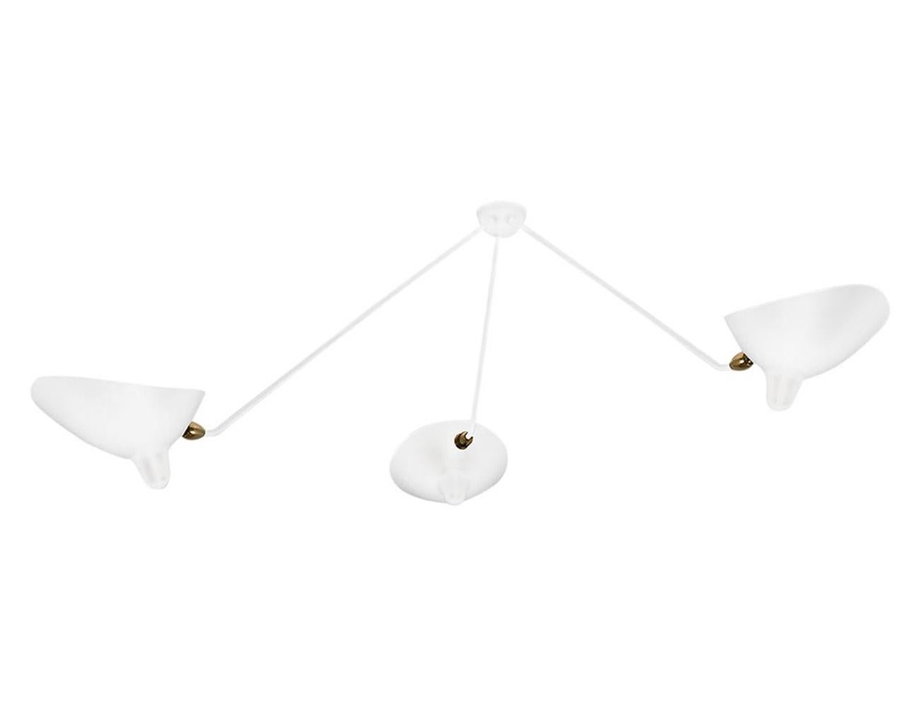 A slight angle at the end of each arm allows this classic design to be equally at home on the ceiling. With rotating heads on fixed arms, the versatility is only rivaled by its beauty.

Available in white or black. Brass swivels connect the