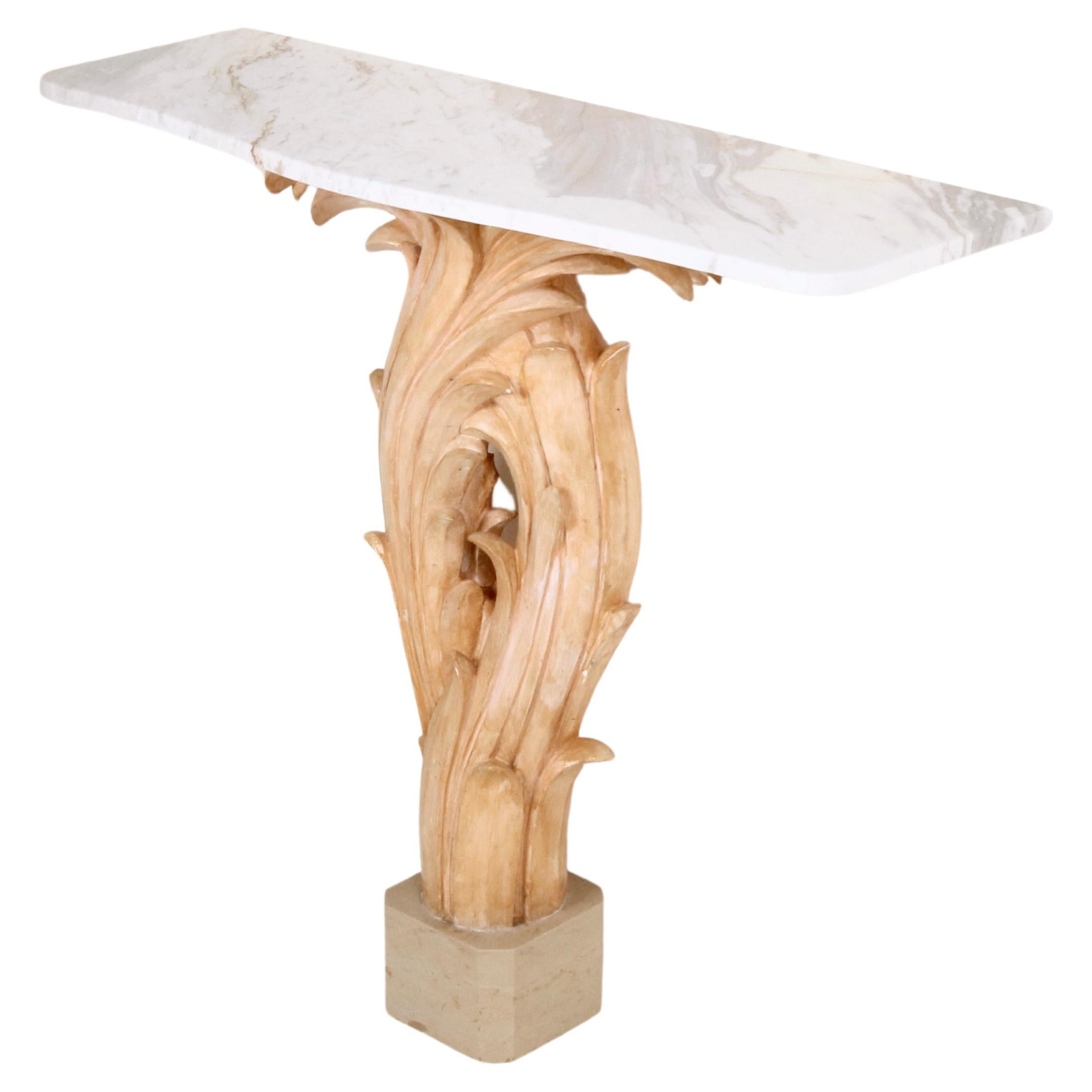 Crafted in the 1950s in France, this console is an exquisite interior with its hand-painted plaster structure, Carrara marble top, and marble base. Its intricate natural motifs, evoking the essence of tree bushes, infuse the design with an organic