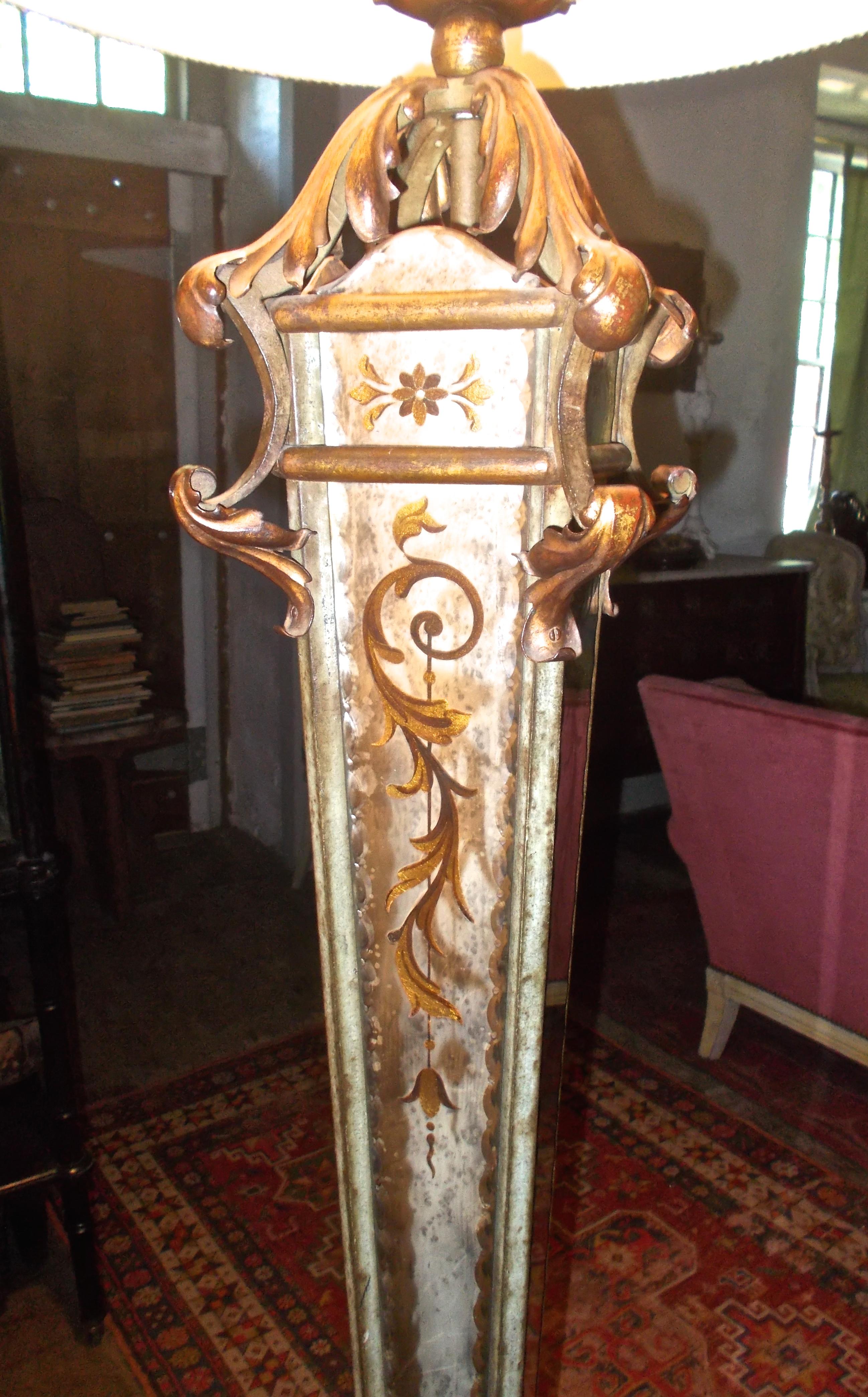 French Serge Roche Attributed Parcel-Gilt Wrought Iron and Verre Églomisé Floor Lamp For Sale