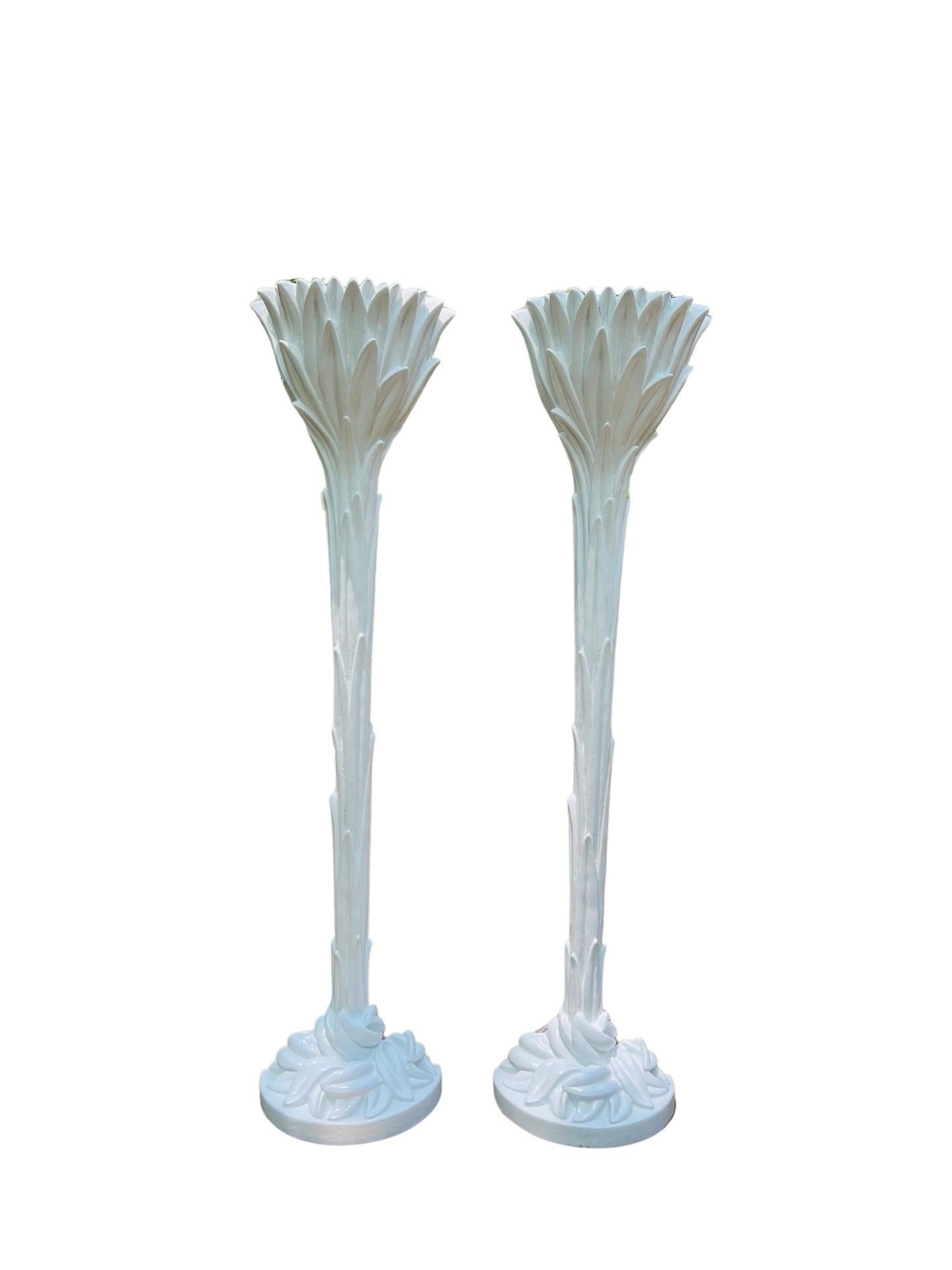 SERGE ROCHE (1898-1988). 

A vintage pair of Serge Roche palm tree torchiere lamps in plaster are highly sought after by collectors and interior design enthusiasts. 
These lamps were produced in the 1930’s  and feature a unique and intricate design