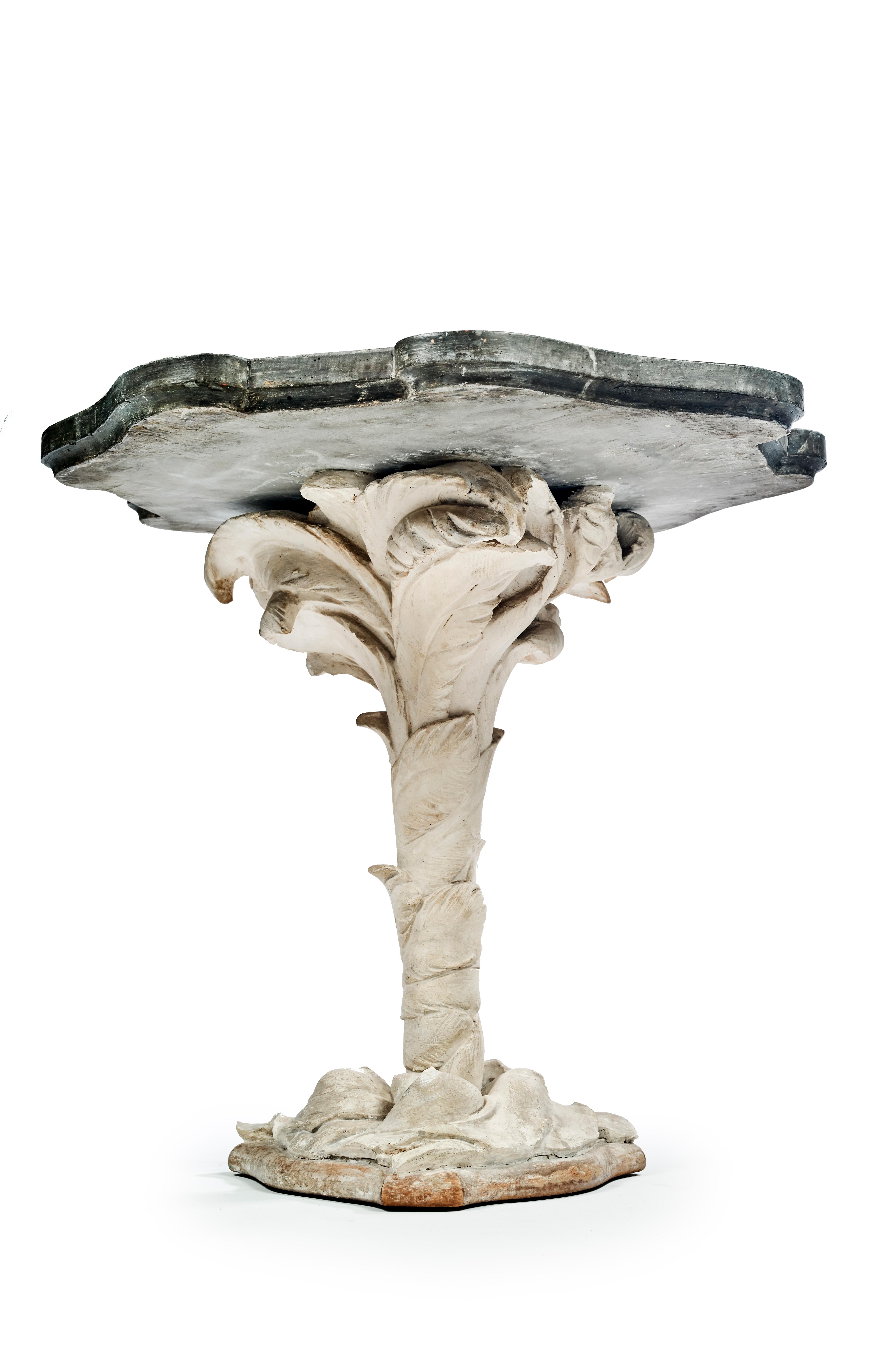 Serge Roche & ISMAËL DE LA SERNA

‘Palmier’ pedestal table

The reinforced stucco leg is designed as a small palm tree, set on a wooden sole from which the palm rises.

The tabletop, in scagliola, imitation marble, also known as stucco marble