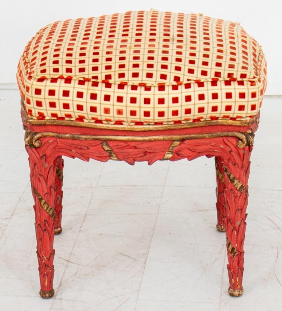 Serge Roche (French, 1898-1988) manner coral red painted and parcel gilded stool or tabouret, 1950's or later, the seat rails and legs in the form of ribbon-tied palms, likely later decorated in coral red, the upholstered seat in a voided velvet