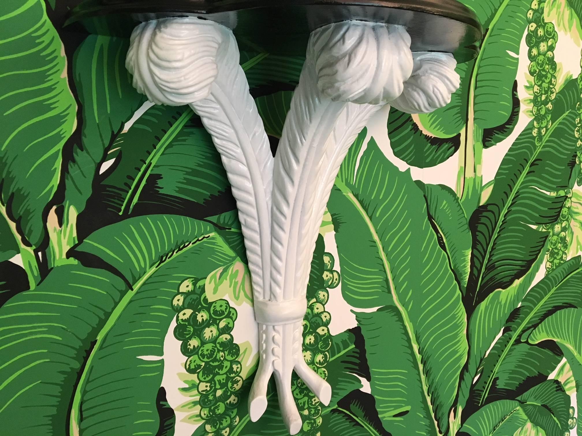 Fabulous pair of large Serge Roche hand-carved plume wall shelves in iconic Dorothy Draper style. Excellent condition with almost no flaws to the newly lacquered black and white finish.