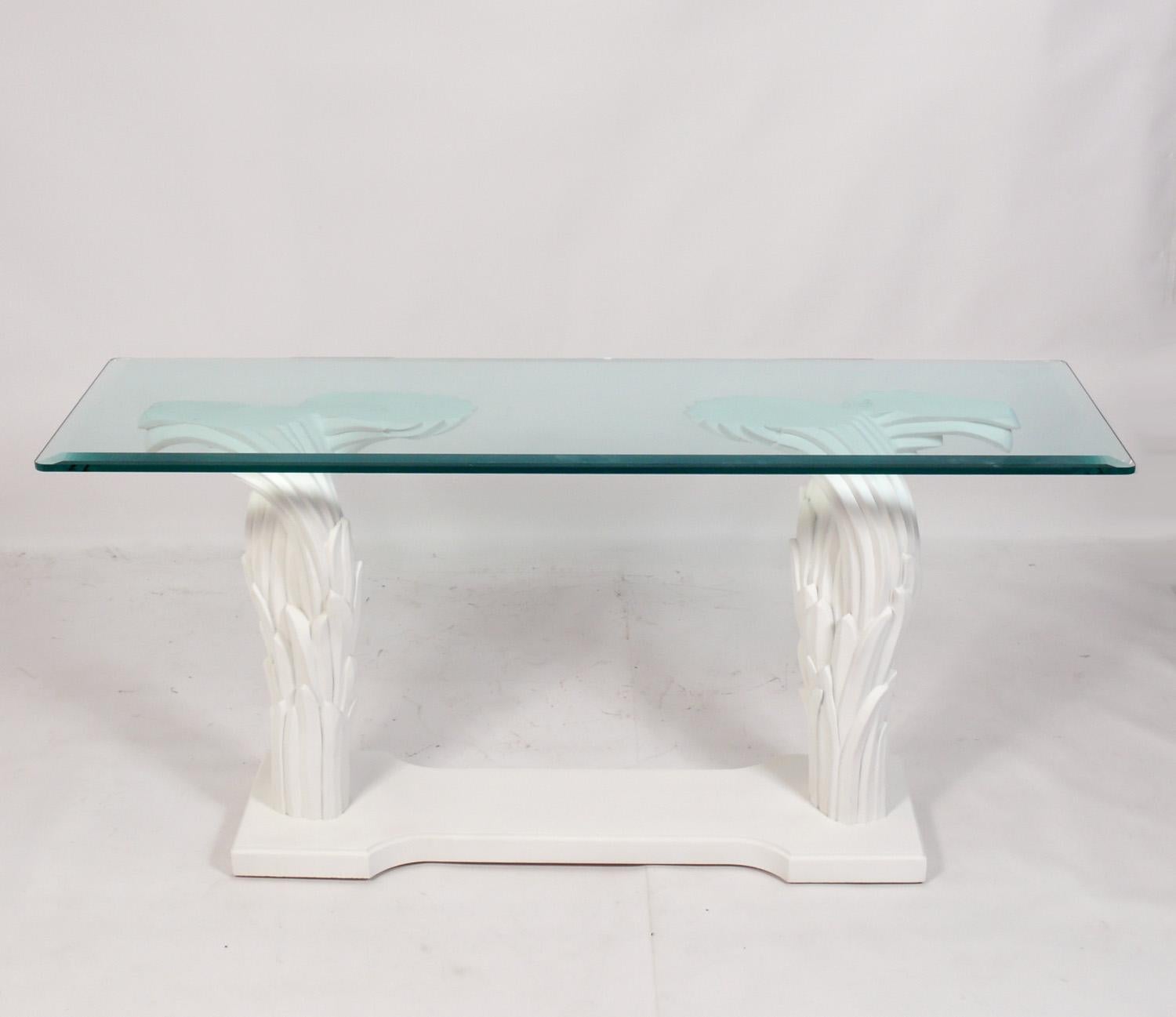 Elegant white plaster console table, in the manner of Serge Roche, probably American, circa 1960s. This piece is a versatile size and can be used as a console table, bar, or media center.