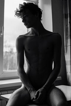 Artem Sitting in front of Window