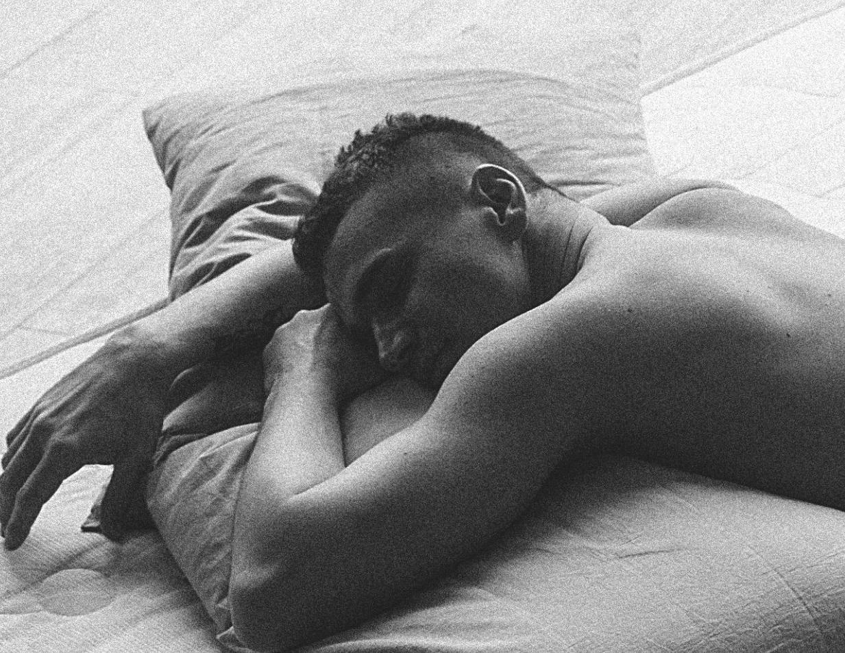 Goshen, Boy on Bed (Seductive youth splayed across mattress) - Print by Sergey Vinogradov