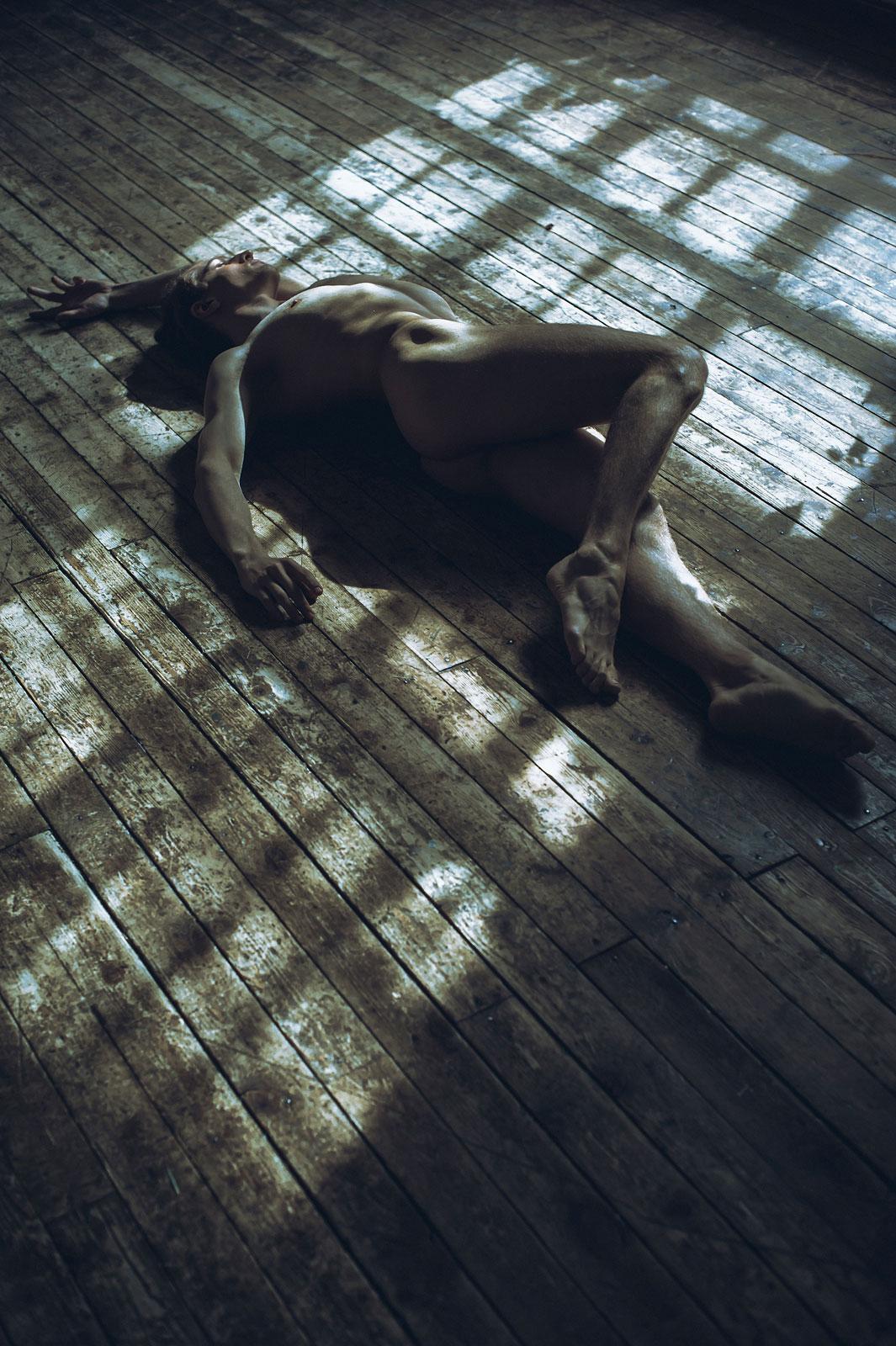 Sergey Vinogradov Figurative Print - Nude sunning on Floor (out of the shadows)