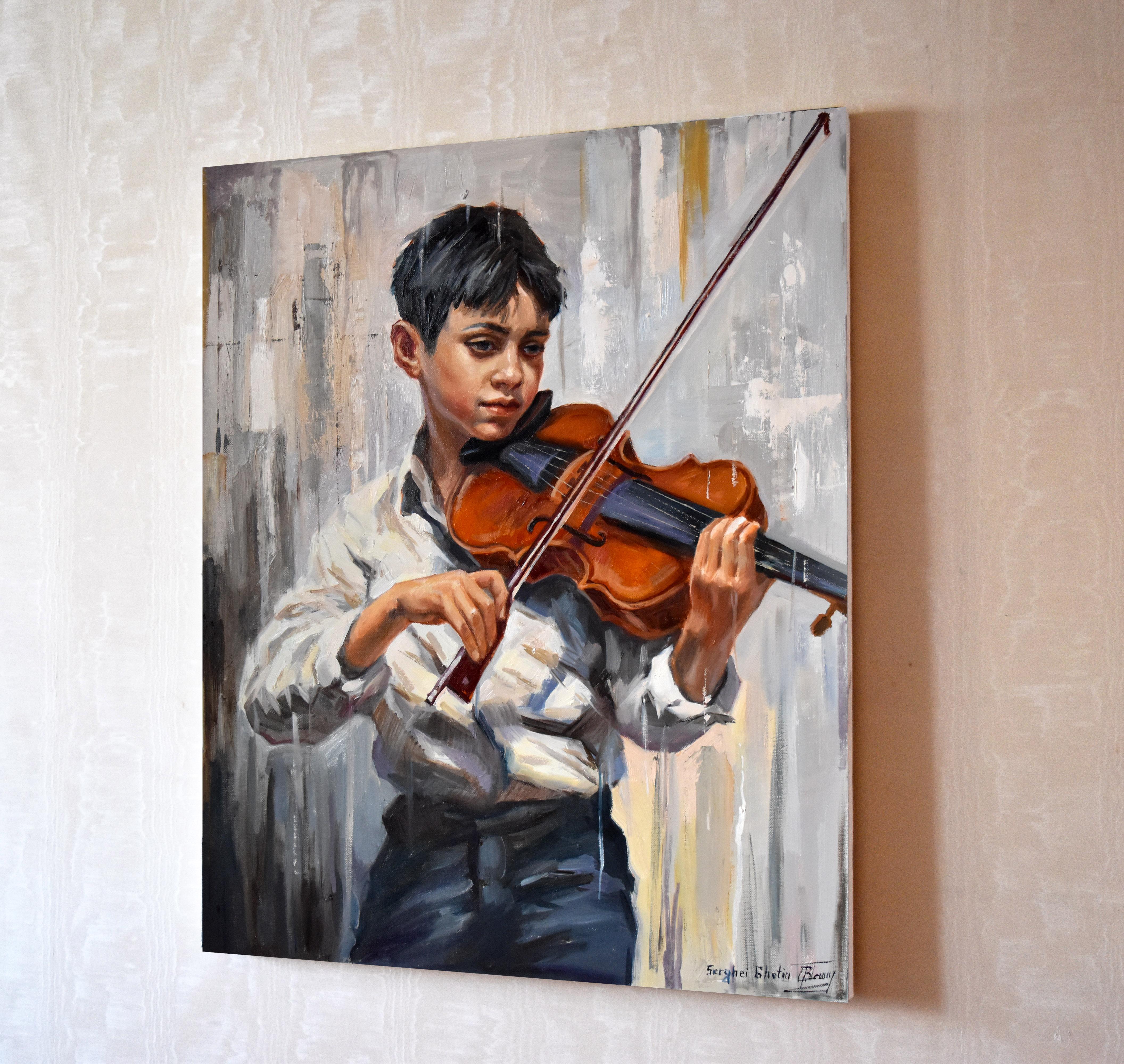 A boy with a violin 1