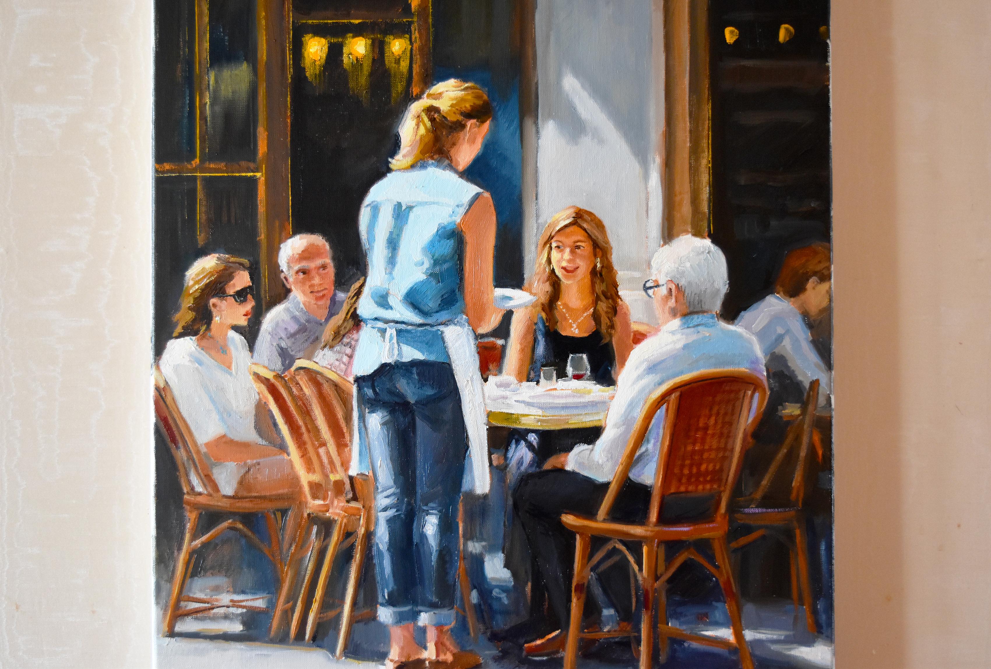 This painting captures a warm moment of connection and everyday joy. Using oil, I blended impressionism with realism to celebrate light, shadow, and human interaction. The scene invites you to feel the lively ambiance and the quiet happiness of