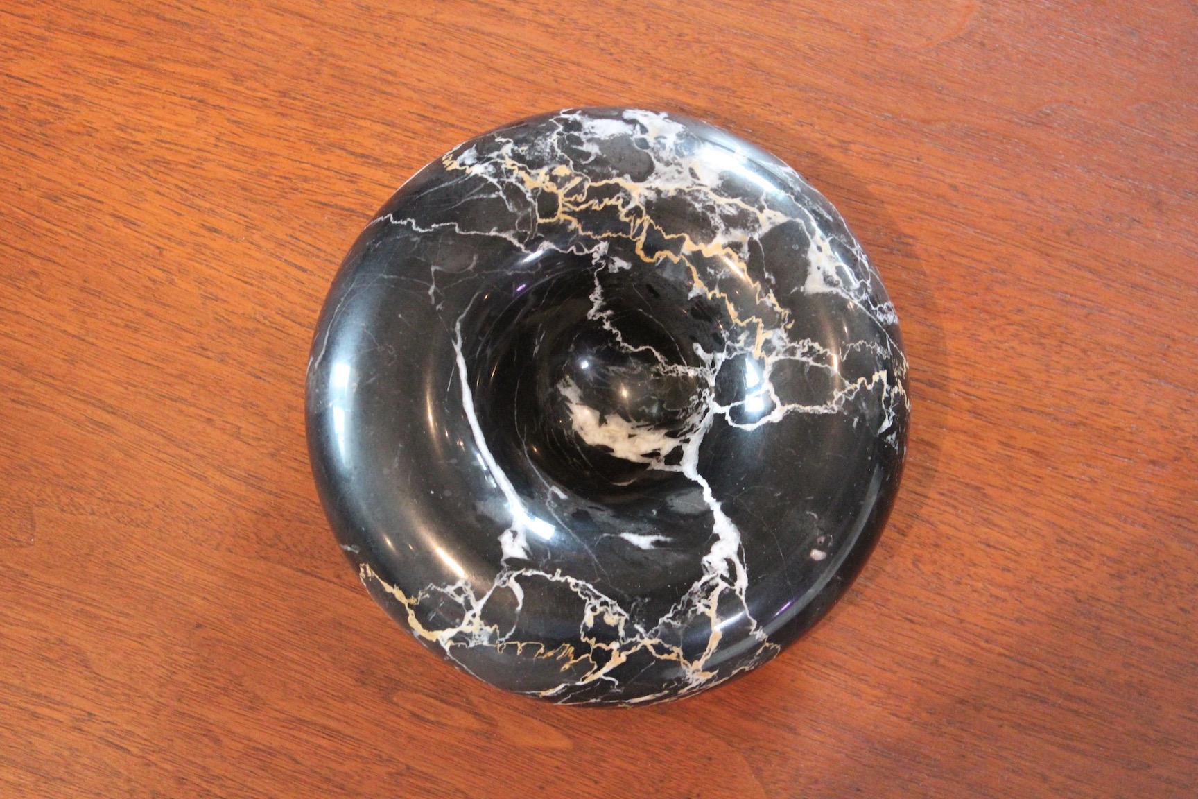 A marble bowl designed by Sergio Asti for Up & Up.