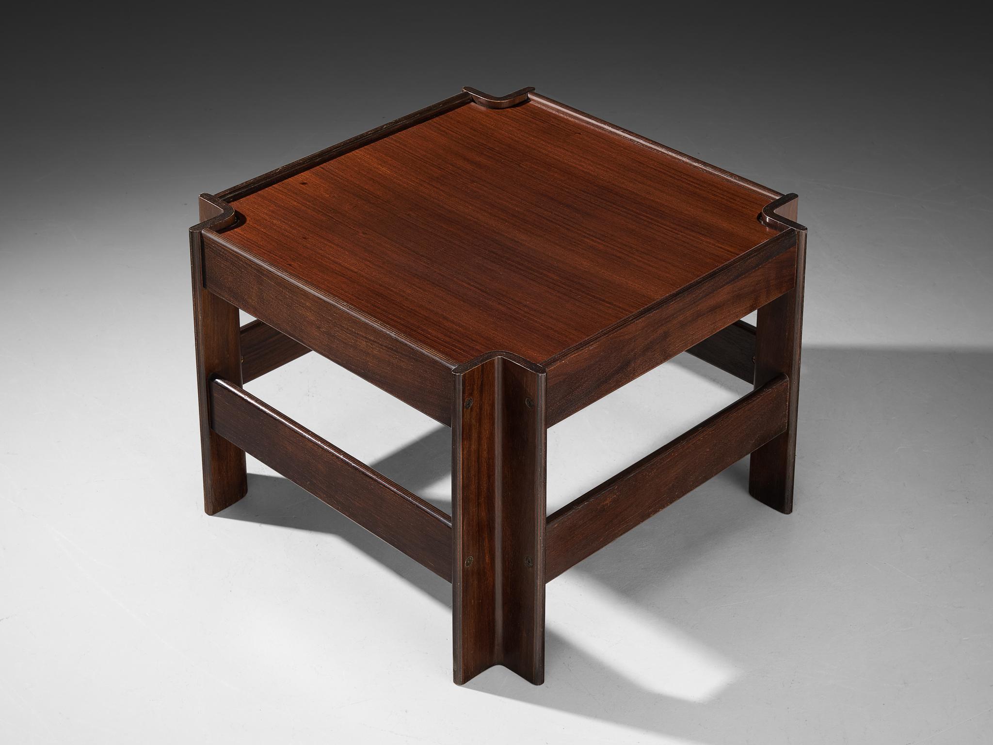 Sergio Asti for Poltronova, 'Zelda' coffee table, walnut plywood, Italy, 1962.

Geometric side table designed by Sergio Asti. Crafted from walnut, the table showcases striking cubist forms. Its angled legs lend a dynamic expression, while the