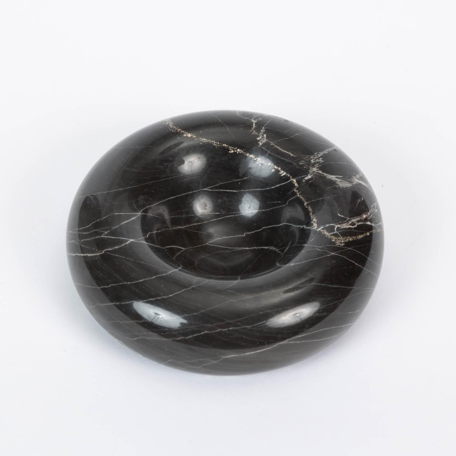 Italian marble art bowl by Sergio Asti for Up & Up, Italy circa 1970s. Polished Massa Carrara black marble with thin white veining. Marked “Made in Italy” and “Up & Up - massa Carrara”

Condition: Excellent vintage condition, no chips or cracks to