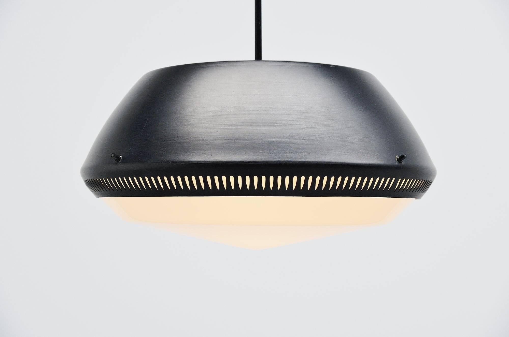 Rare and large pendant lamp designed by Sergio Asti for Artelcuce Milano, Italy 1950. This super large and nicely shaped pendant lamp is often sold as a design by Gino Sarfatti but this lamp was designed by Sergio Asti. The lamp has a black painted