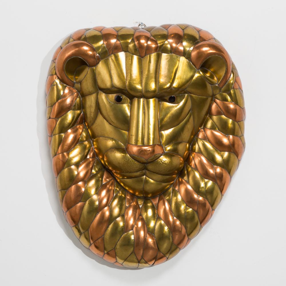 Sergio Bustamante designed brass and copper handmade lion wall mask sculpture, Mexico, 1960s. 

Sergio Bustamante is a Mexican Artist and sculptor. He began with paintings and papier mâché figures, inaugurating the first exhibit of his works at