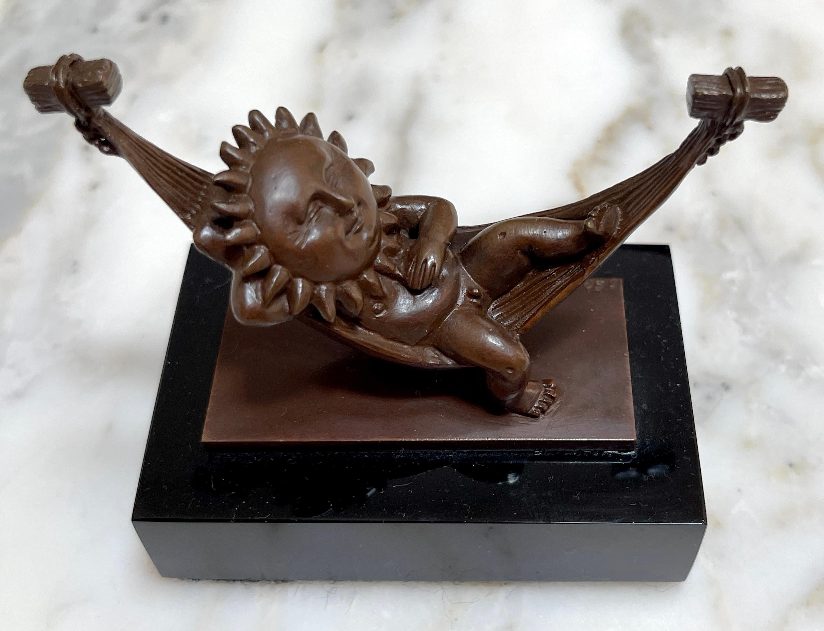 Sergio Bustamante Bronze Lounging Sun Sculpture 
Mexico, late 20th century 
A highly detailed diminutive bronze sculpture of the sun ( a male - who knew ?) reclining in a hammock. 
Signed /incised in base 'Sergio Bustamante 83/100, copyright