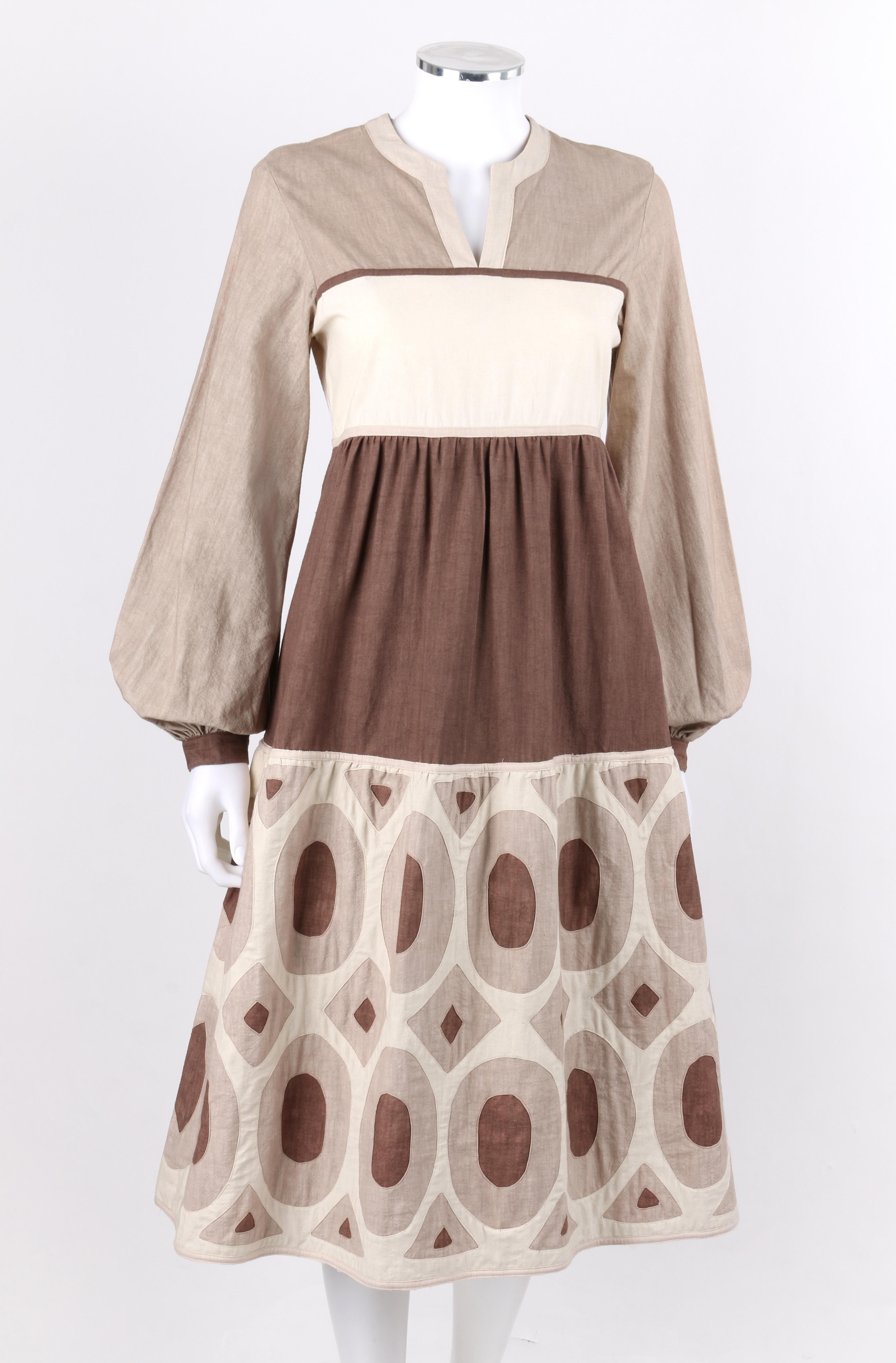 SERGIO BUSTAMANTE c.1970's Hand-Dyed Brown Geometric Long Sleeve Day Dress Rare
Circa: 1970's
Label(s): Sergio Bustamante 
Designer: Sergio Bustamante 
Stil: Midikleid
Farbe(n): Schattierungen von Braun 
Gefüttert: Nein
Markierter Stoffgehalt: 