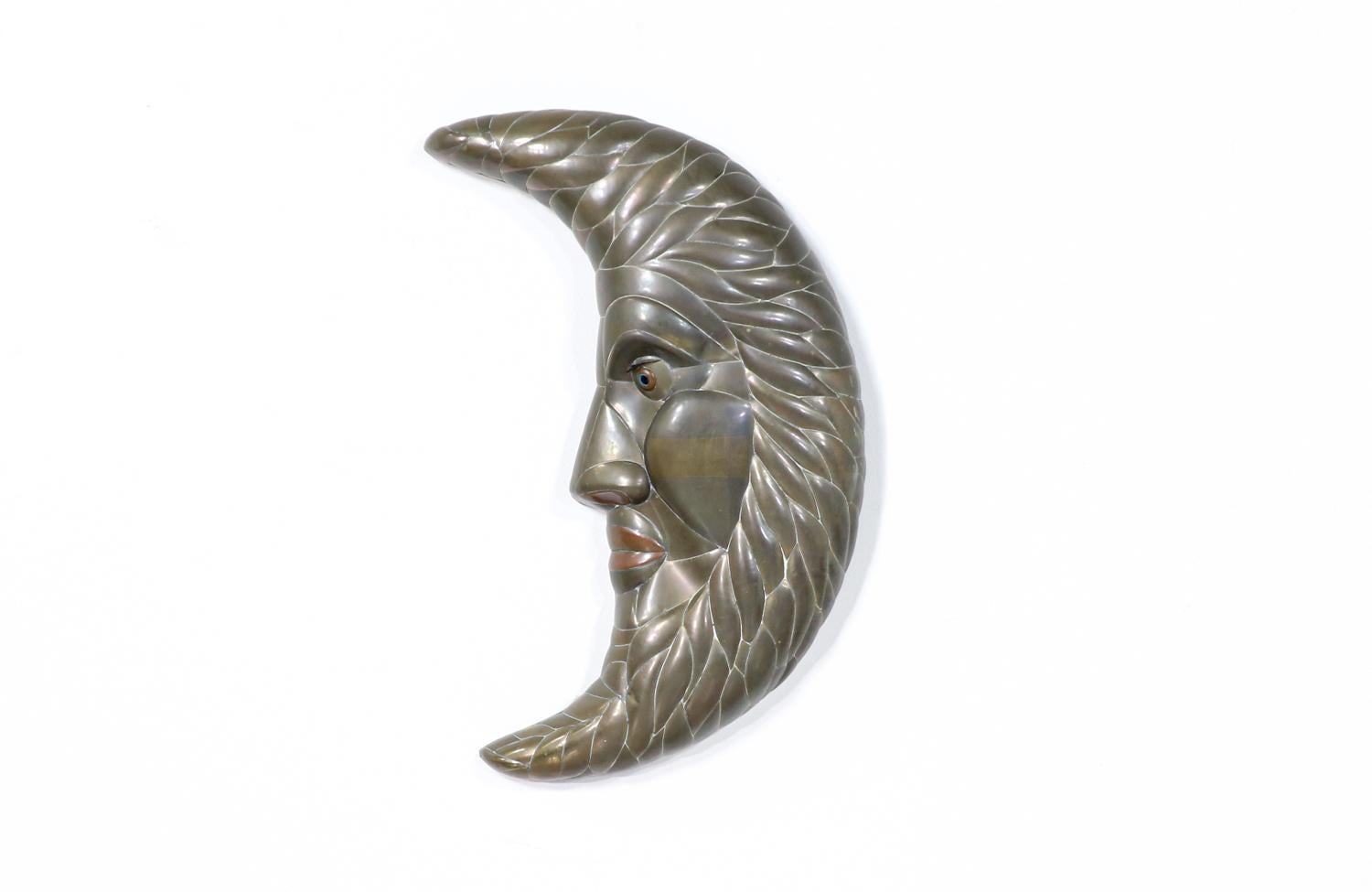 Sergio Bustamante Crescent moon metal wall sculpture.