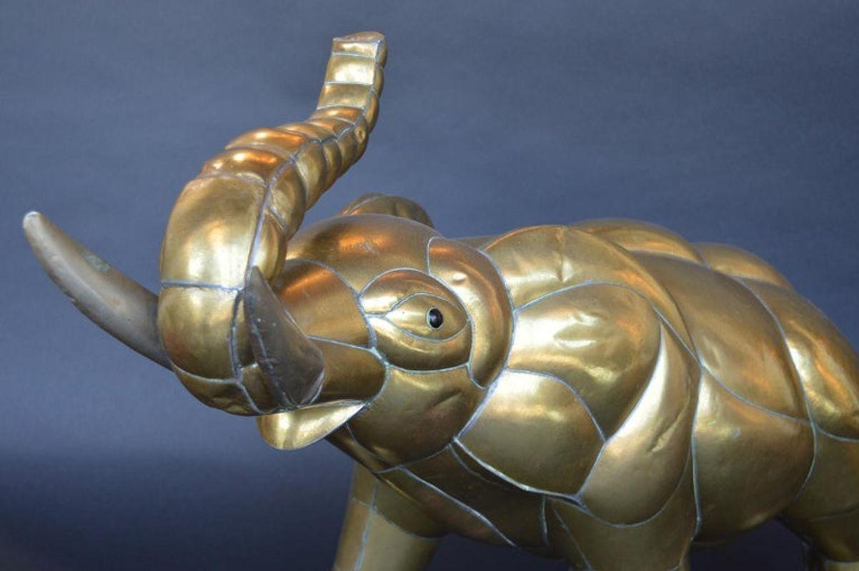 Brass elephant by Sergio Bustamante.