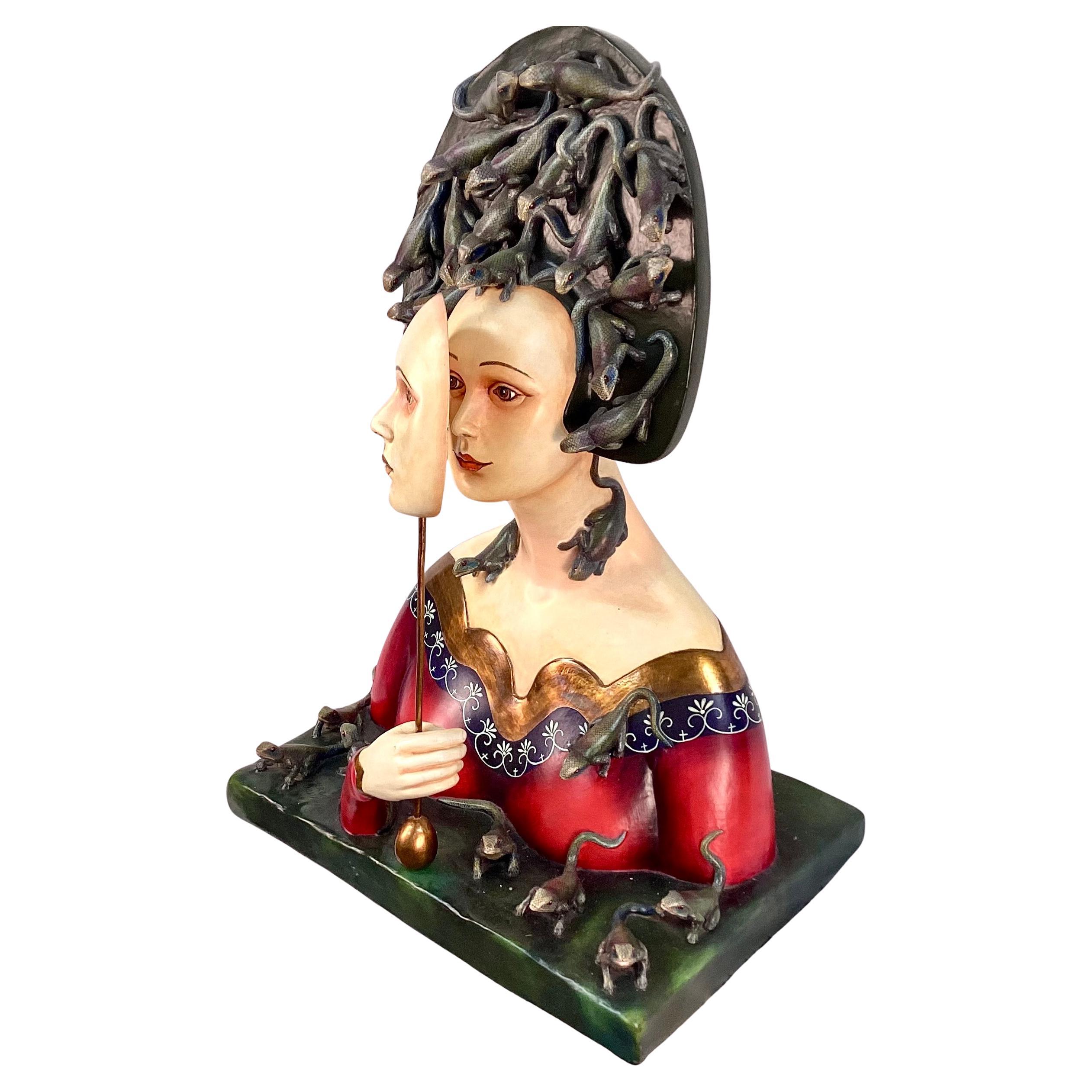 Stunning Sergio Bustamante (Mexican Artist, 1949- ), Female Bust with Lizards, Ceramic And Mixed Media. Woman is holding a detachable face mask on a gold stick. Bustamante often combines surrealism and folk art. This sculpture likely explores themes