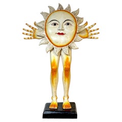 Escultura monumental tallada de un sol, de Sergio Bustamante, México, alrededor de la década de 1980