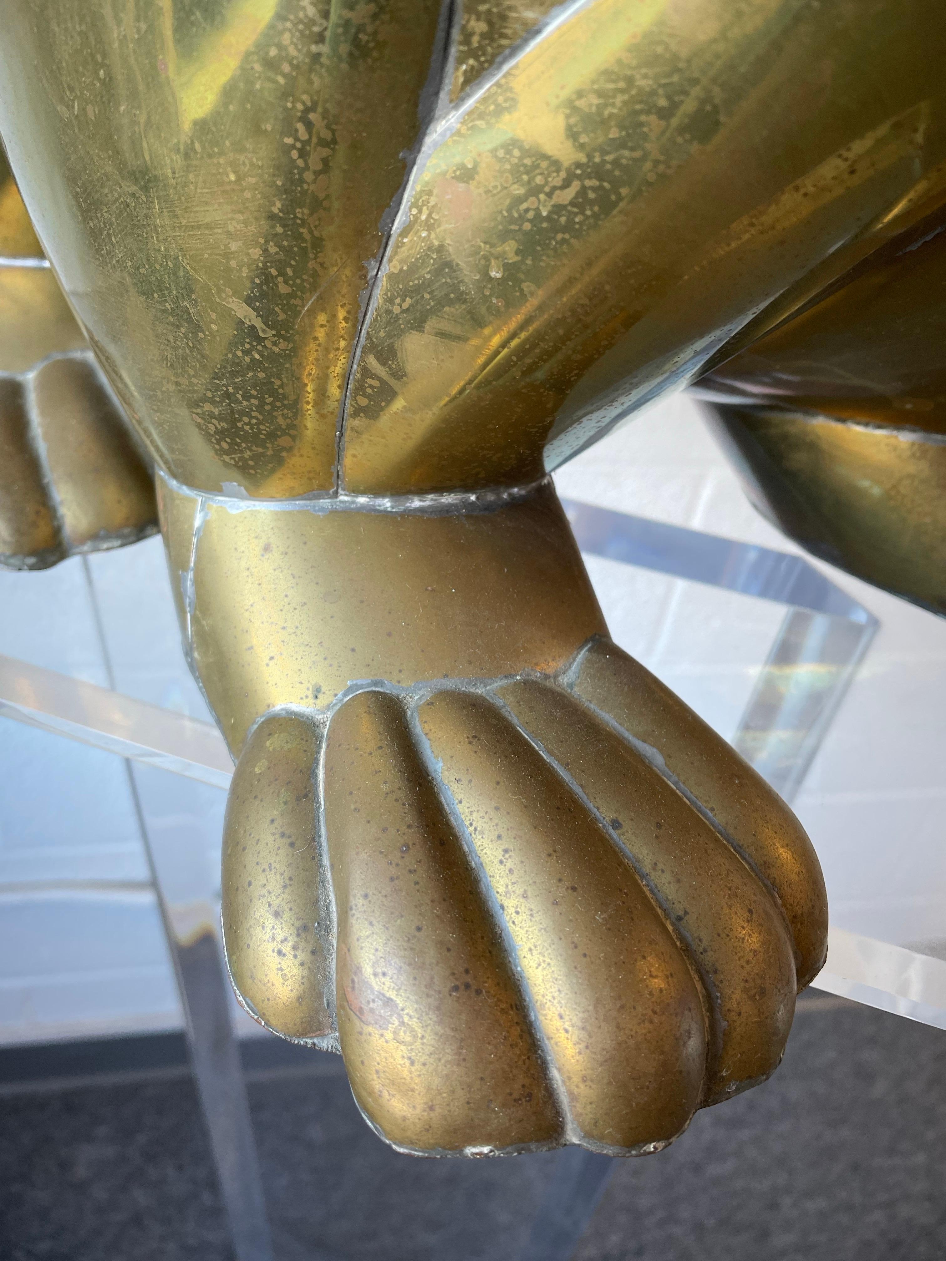 Larger than life raccoon sculpture created out of shaped brass and copper (hollow) by Mexican artist Sergio Bustamante. Signed behind head and numbered 4 of 100.