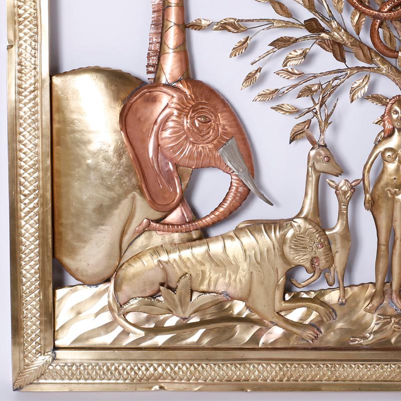 Striking mid century wall sculpture ambitiously crafted in brass and copper with a folky naive style depicting a cast of characters including Adam and Eve and the apple, big cats, giraffes, a monkey, an elephant, and of course, the serpent. Hand