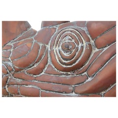 Scultura moderna astratta in metallo a forma di testa di rinoceronte