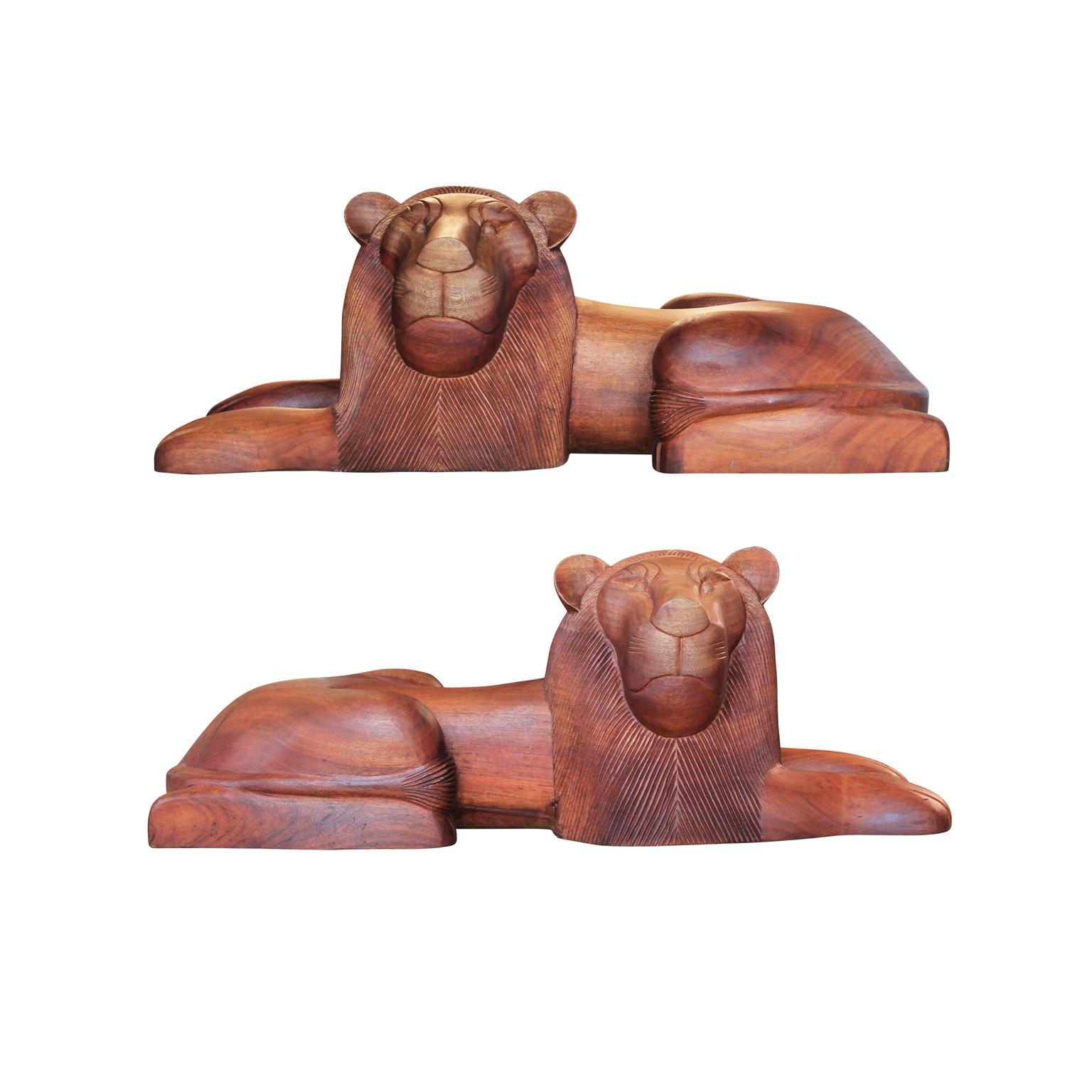 Sergio Bustamante Abstract Sculpture - Pair of Stylized Mid Century Modern Carved Solid Teak Wood Lion Sculptures
