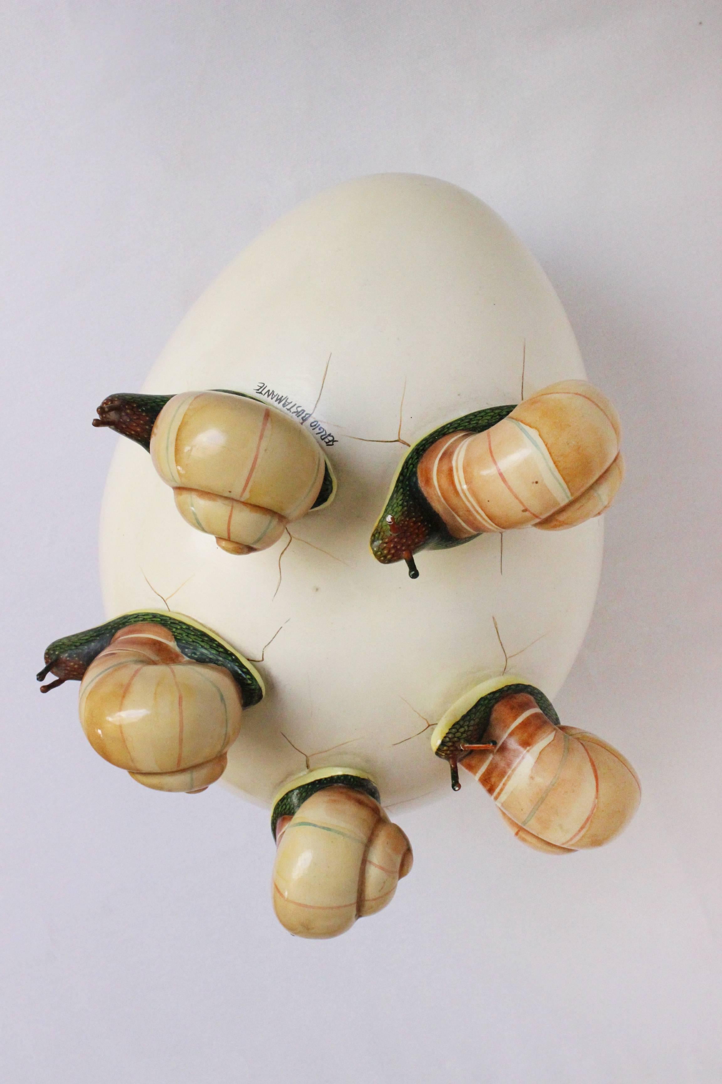 Snail egg Sculpture
Sergio Bustamante
Polychromed Ceramic
22 x 25 x 20 cm
1980, MX
No base

Sergio Bustamante is a Mexican Artist and sculptor. Though born in Culiacan, Sinaloa, Mexico, Sergio Bustamante has lived in the Guadalajara area since early