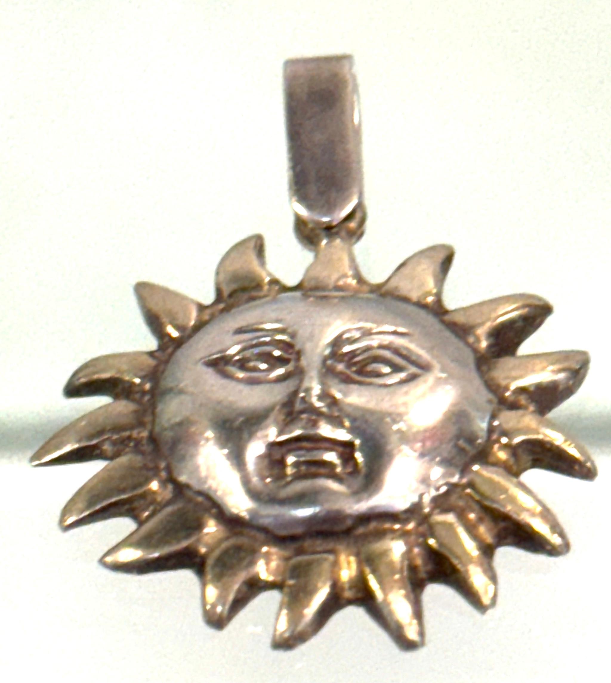 Sergio Bustamante Sterling Silver Limited Edition Sun Face Pendant with Gilt Rays, Numbered 6/99, Mexico, Circa 1980s–1990s
Dimensions: 1