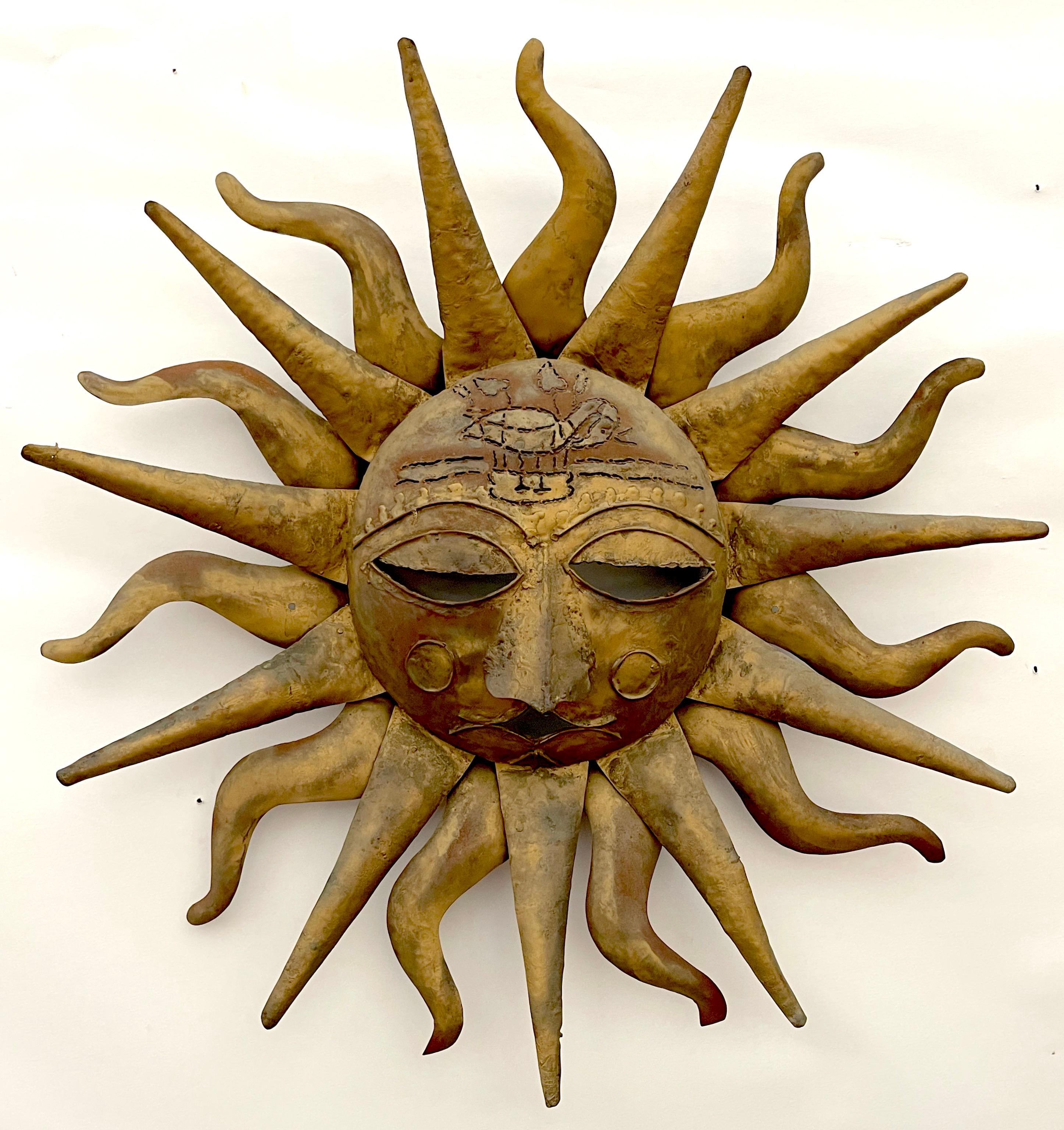 Sergio Bustamante Style Gilt & Polychromed Sun Wall Sculpture 
Mexico, Circa 1960s, Unmarked
A magnificent Sergio Bustamante Style Gilt & Polychromed Sun Wall Sculpture, from 1960s Mexico. This striking wall sculpture, in the iconic style of Sergio