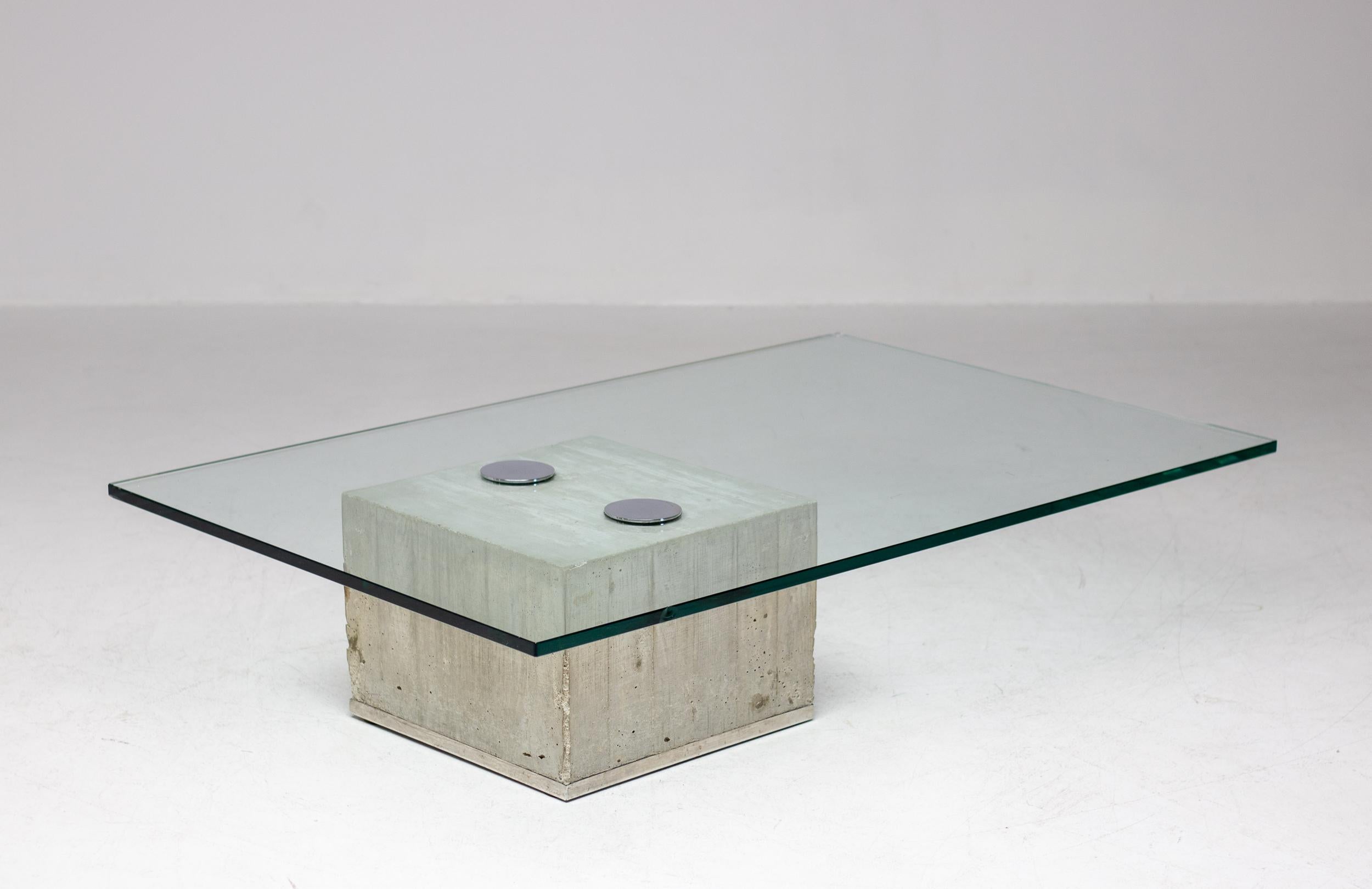 Brutalist concrete coffee table 'Sapo', made in glass, concrete and chromed steel, designed by Sergio & Giorgio Saporiti for Saporiti, Italy, 1972.  This table called model 'Sapo' is made of a solid concrete base with a glass top attached. Due to