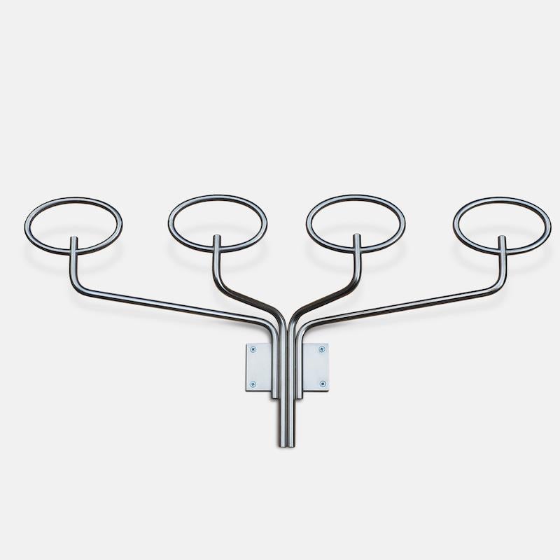 This large wall-mounted Clitroquattro coat rack designed by Sergio Mazza for Artimede is beautifully engineered and has a matte nickel plate finish over brass. Architecturally imposing with clean lines and a minimal aesthetic this piece embodies