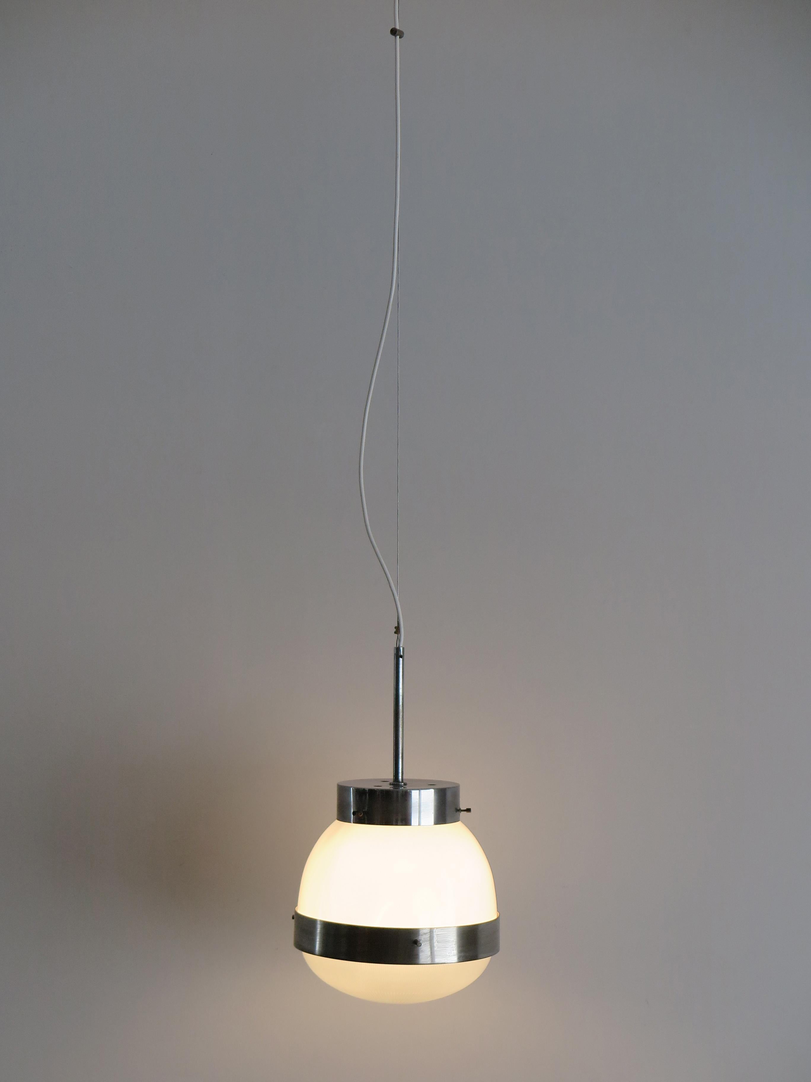 Italian Mid-Century Modern design pendant lamp model Delta designed by Sergio Mazza and produced by Artemide; chromed metal, opal glass and pressed glass, circa 1960s.

Please note that the lamp is original of the period and this shows normal