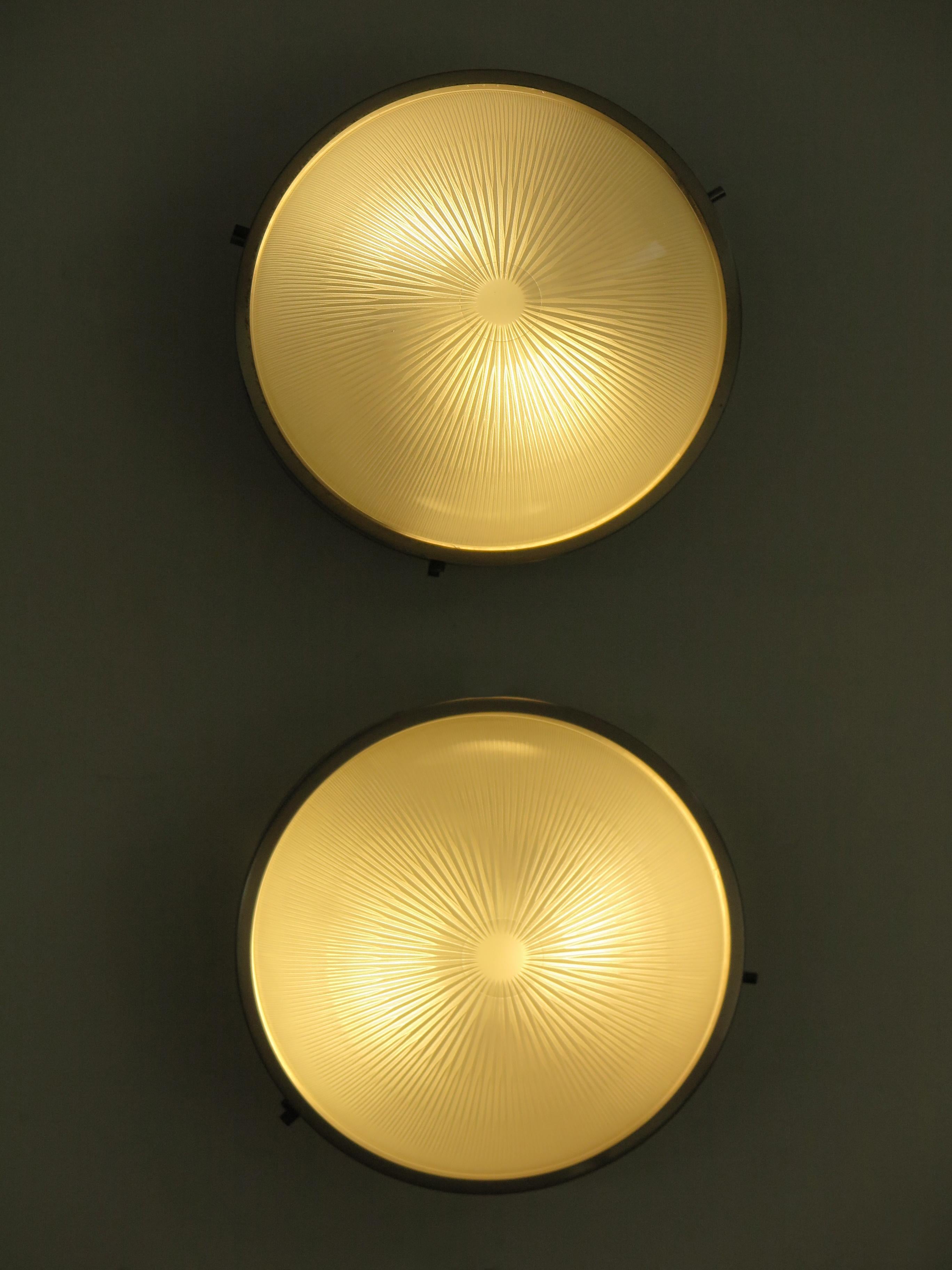 Italian midcentury modern design sconces wall lamp or ceiling lamp model Sigma designed by Sergio Mazza and produced by Artemide with nickel-plated brass structure and molded glass bowl, Italy 1960s. 

Please note that the lamps are original of the