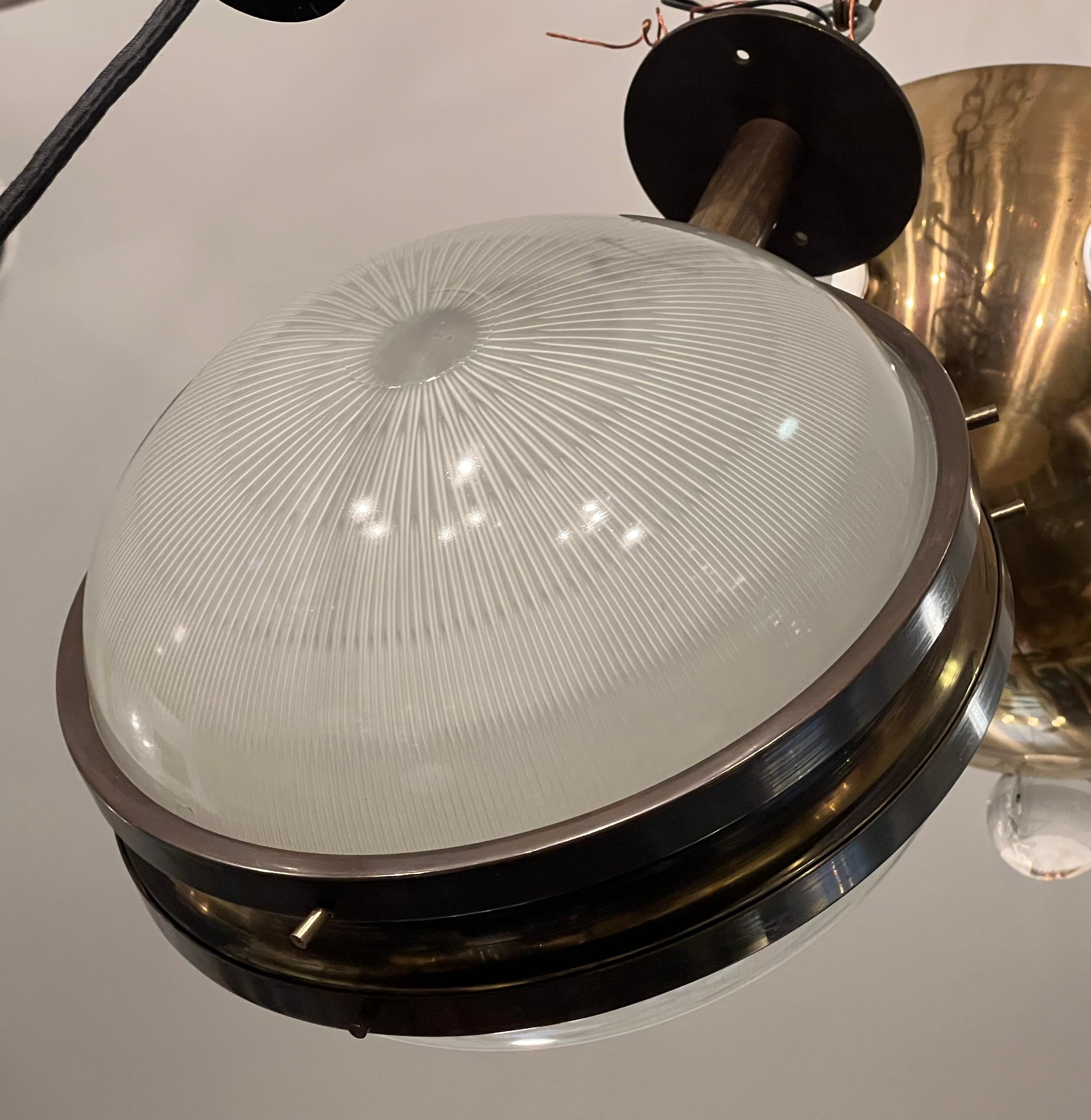 An original Gamma ceiling or wall lamp in dark aged brass by Sergio Mazza for Artemide. 1960. Can match up a pair if needed.