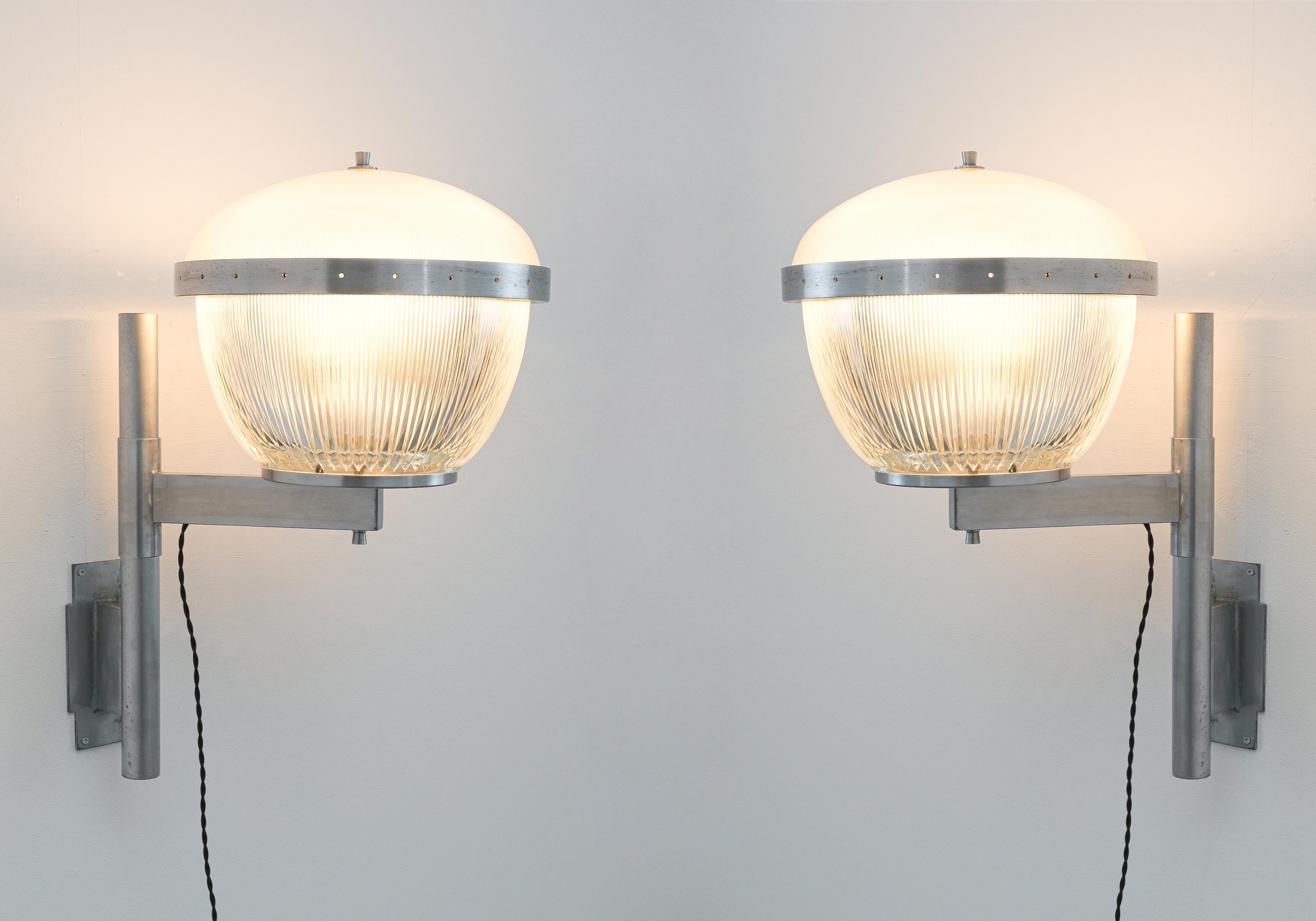 Set of six (6) Sergio Mazza v wall lamps, Artemide, circa 1960. Priced and sold per piece. Six large Sergio Mazza wall lights made from brass, nickel and glass.It's such an astonishing find in itself and they look even more fantastic in person. We