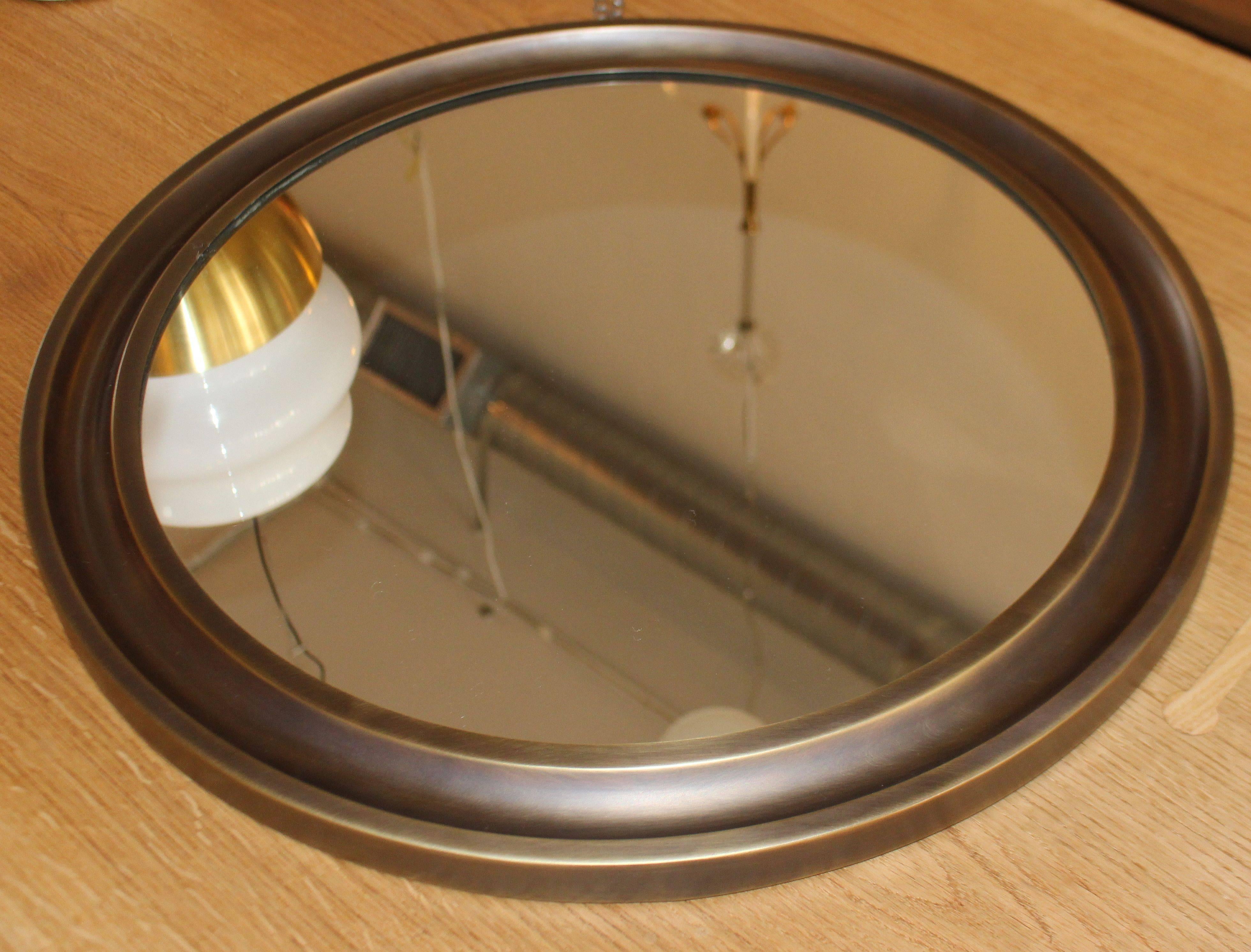 Italian pair of brass round mirrors by Sergio Mazza.