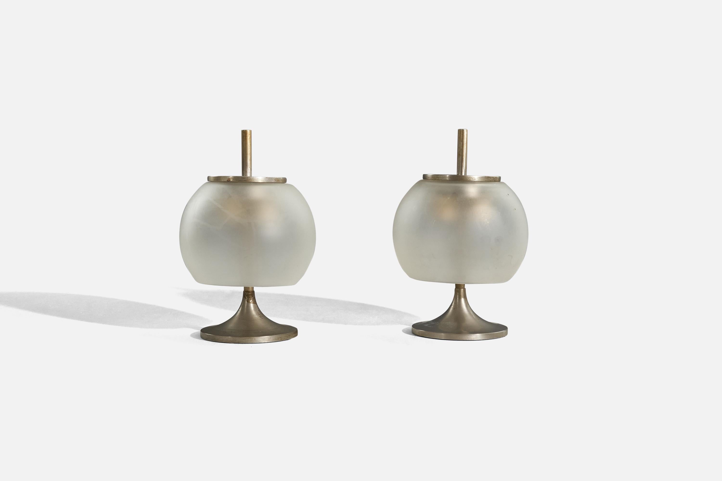 A pair of steel and glass table lamps designed by Sergio Mazza and produced by Artemide, Italy, c. 1950s.

