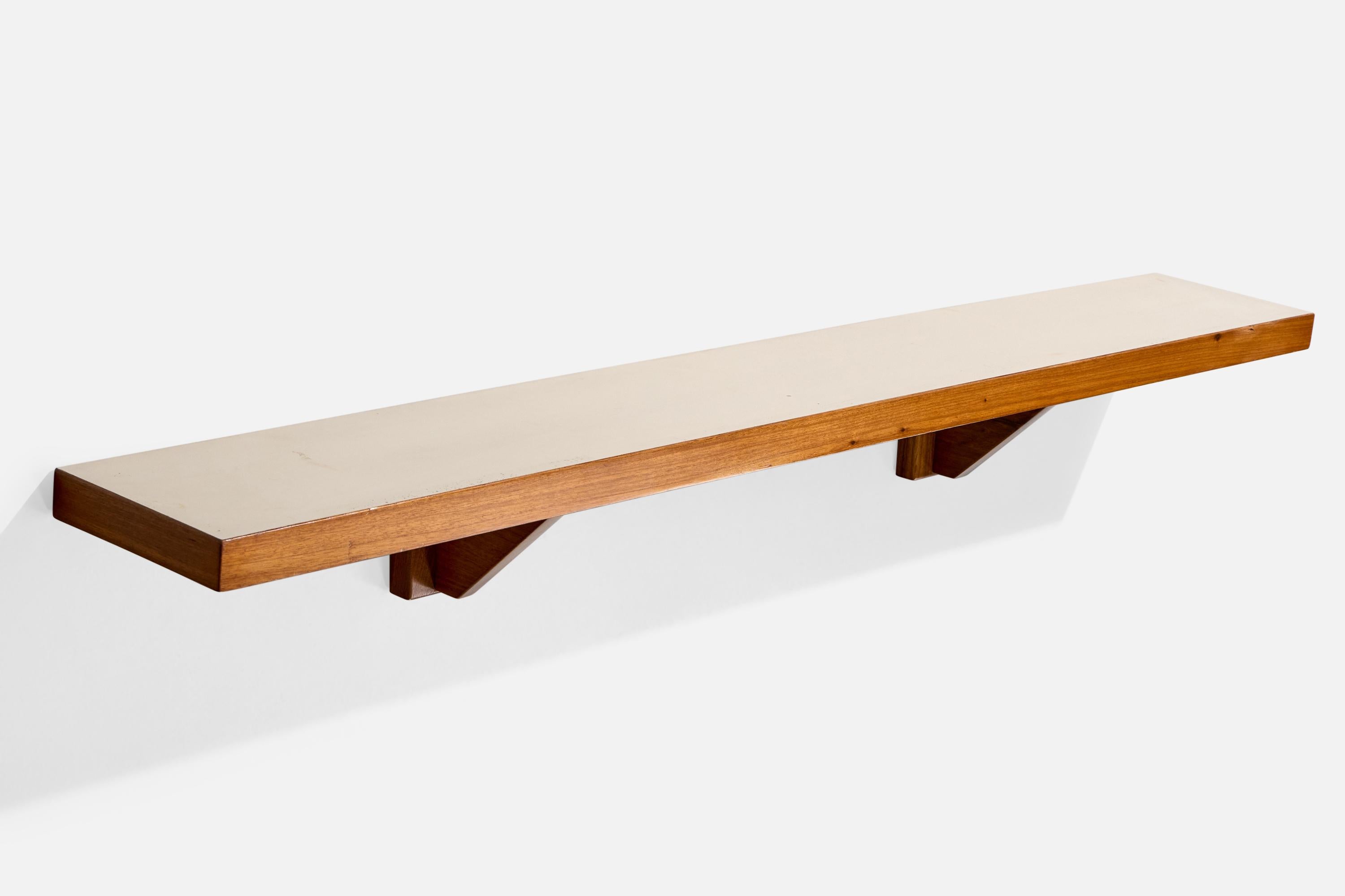 A wall-mounted wood and white formica 
