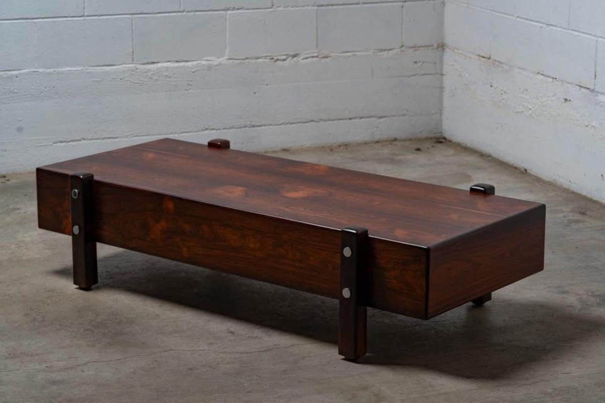 An exceptionally rare and museum-worthy example of Brazilian modernism, this “Eleh” bench by Sergio Rodrigues is one of the most elusive and architecturally significant pieces from his oeuvre. Designed in the 1960s and crafted at the famed OCA