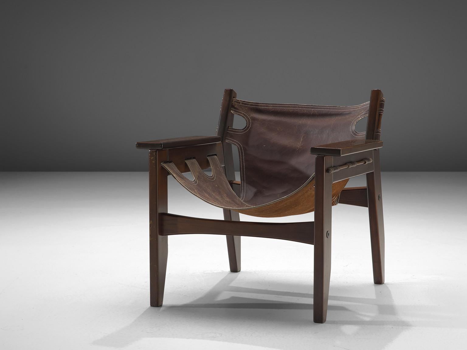 Sergio Rodrigues for OCA, 'Kilin' armchair, hardwood, leather, Brazil, 1973

'Kilin' easy chair in hardwood and brown leather designed by Sergio Rodrigues in 1973. This chair has a sturdy appearance and is designed with high attention to detail.