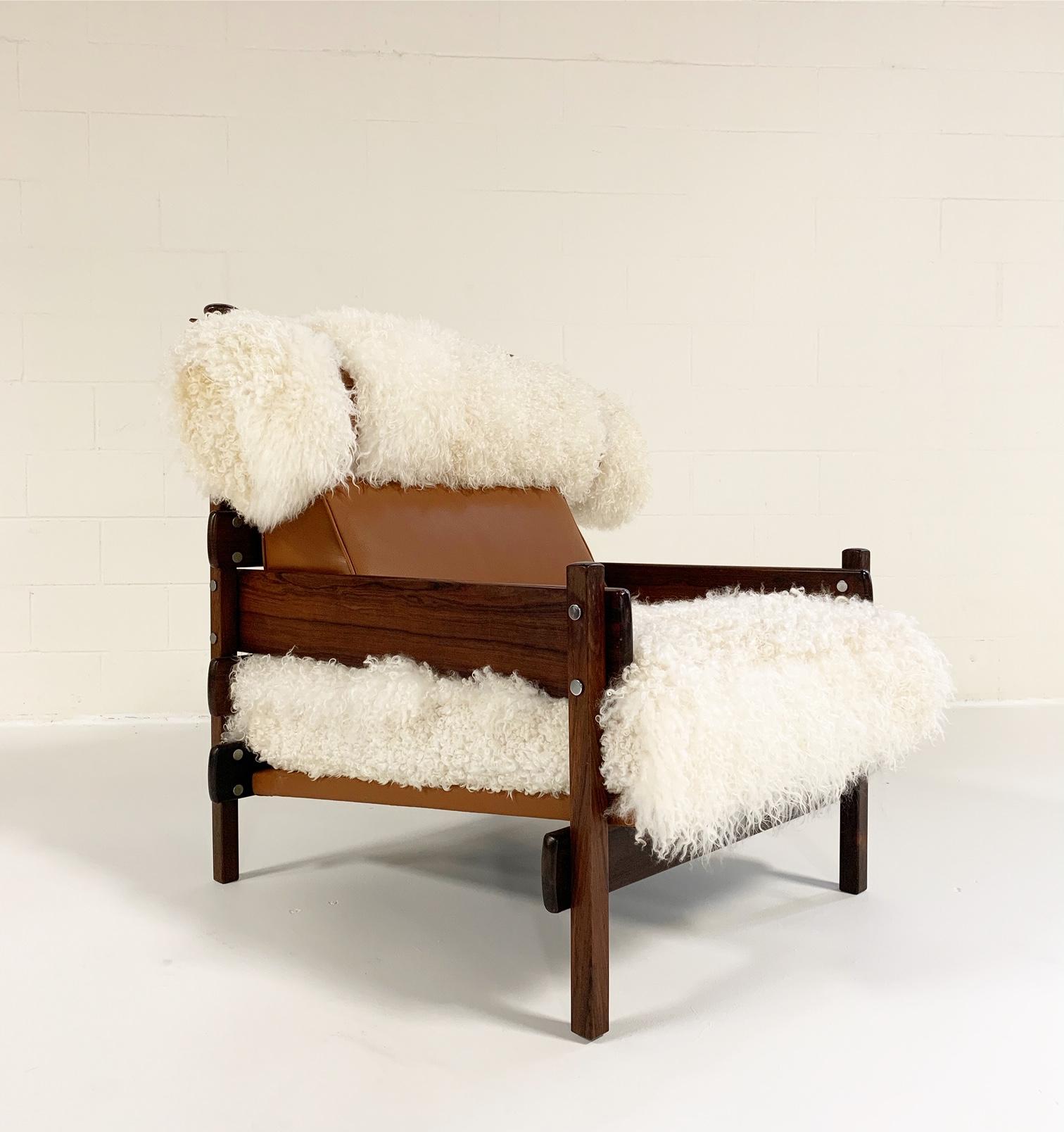 One of a Kind Sergio Rodrigues for Oca Solid Jacaranda chair restored in Gotland sheepskin and Loro Piana Italian buffalo leather by Forsyth in Saint Louis.

Brazilian architect-designer Sergio Rodrigues was born in 1927 in Rio de Janeiro to a